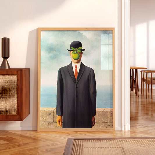 René Magritte The Son of Man wall art print displayed in a bright modern living room