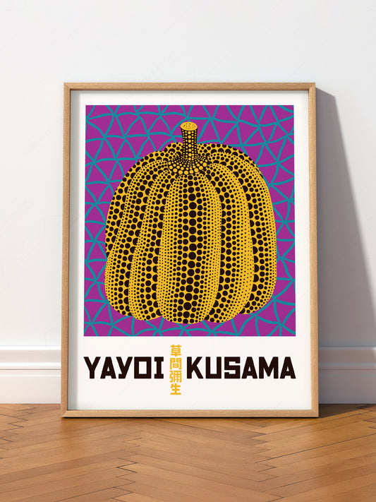 Yayoi Kusama Pumpkin wall art print displayed in a bright modern living room