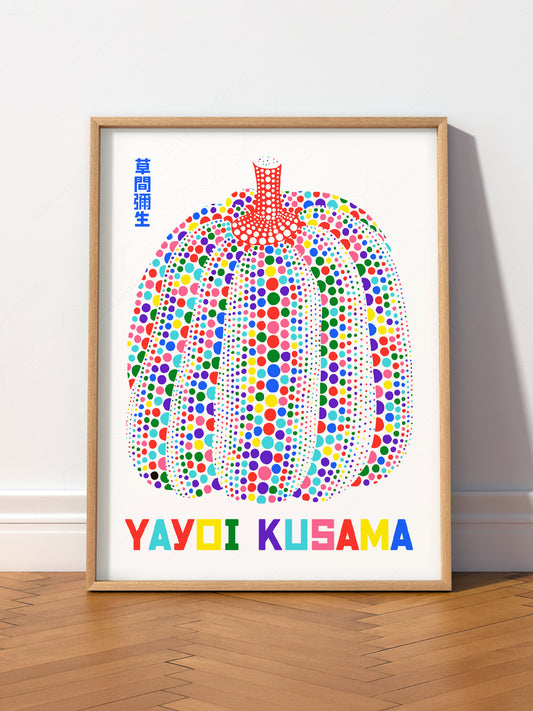 Yayoi Kusama Colorful Pumpkin wall art print displayed in a bright modern living room