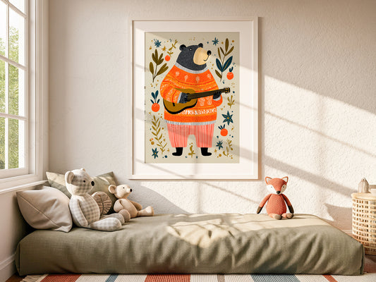 A vertical nursery art print of a whimsical black bear standing and playing an acoustic guitar. The bear is wearing a highly detailed orange and white patterned sweater with red and white striped pants. The scene is set on a light cream background decorated with stylized teal leaves, gold stars, and bright orange berries.