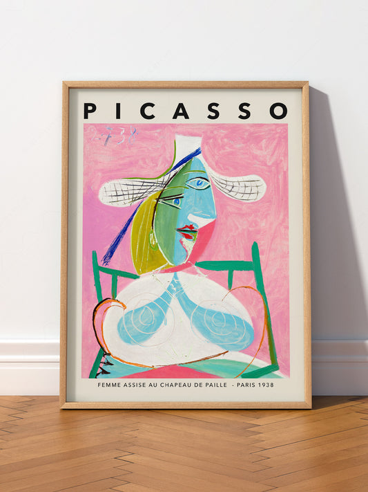 Pablo Picasso Femme Assise au Chapeau wall art print displayed in a bright modern living room
