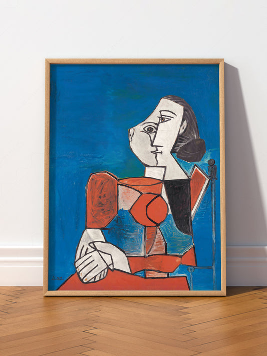 Pablo Picasso Femme Seated Woman wall art print displayed in a bright modern living room