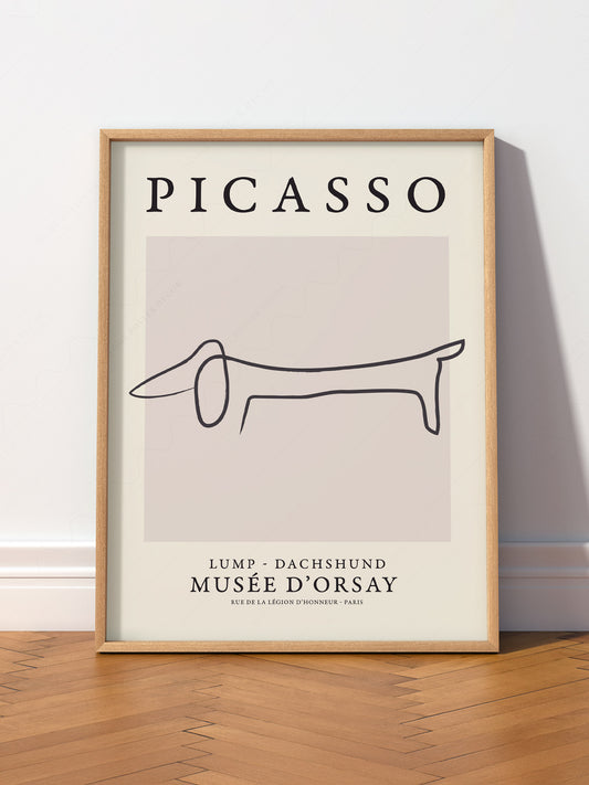 Pablo Picasso Lump Dachshund Line wall art print displayed in a bright modern living room