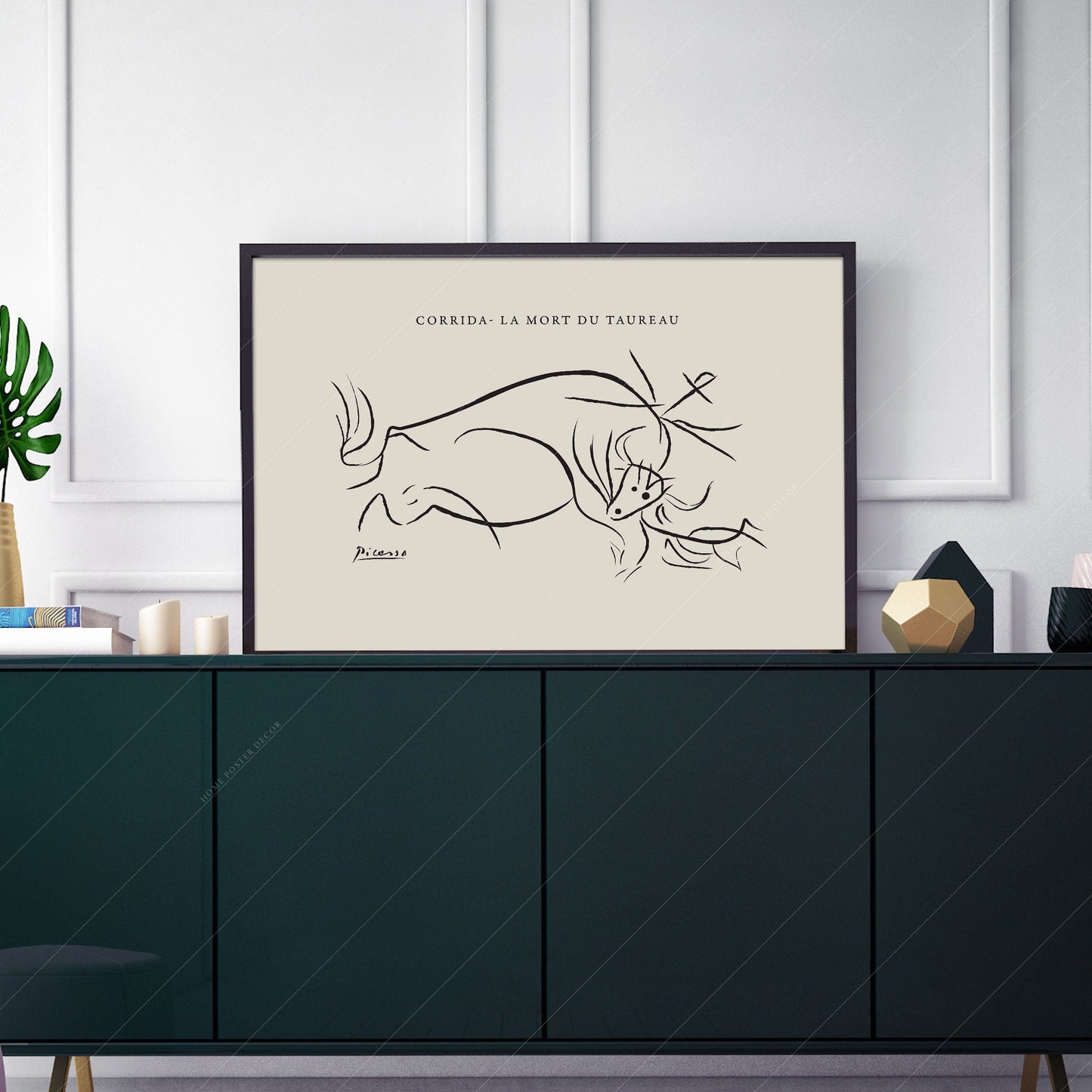 Pablo Picasso art print as wall decor in a minimalist home office
