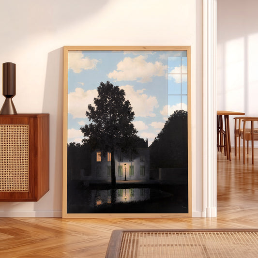 René Magritte Empire of Light wall art print displayed in a bright modern living room