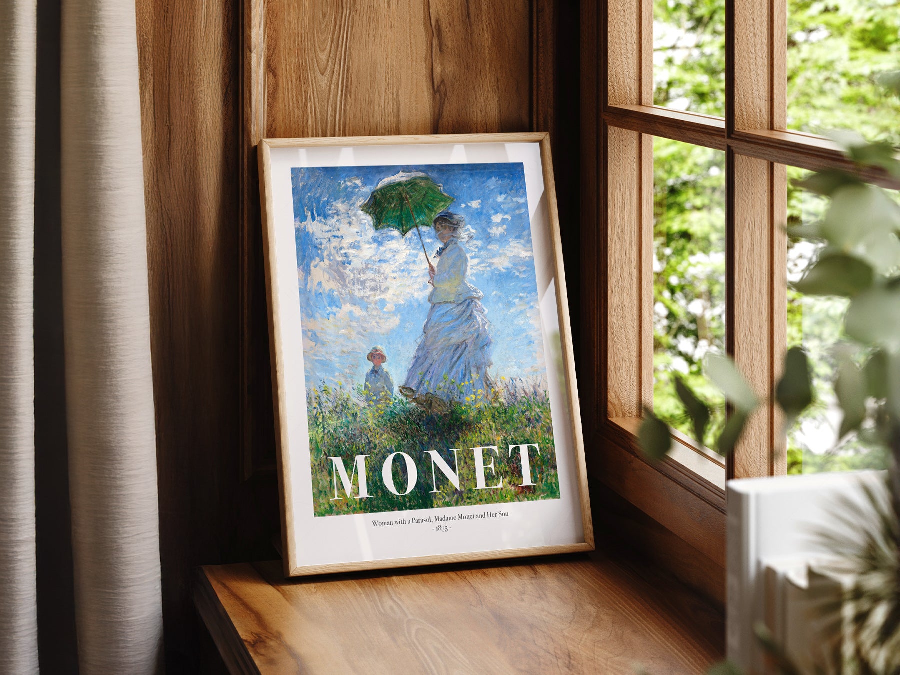 Claude Monet Woman with a Parasol wall art print displayed in a bright modern living room