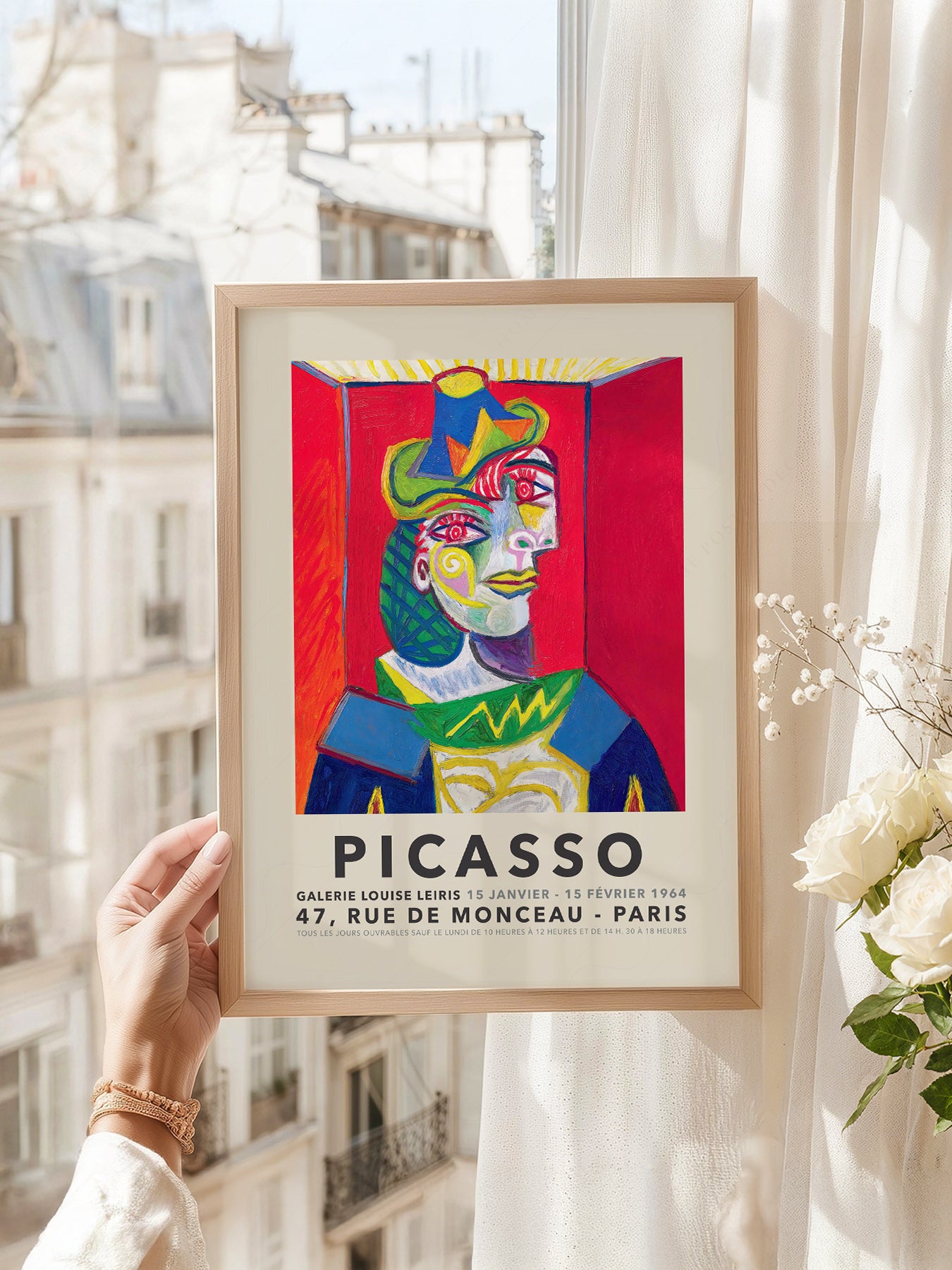 Pablo Picasso art print as wall decor in a minimalist home office