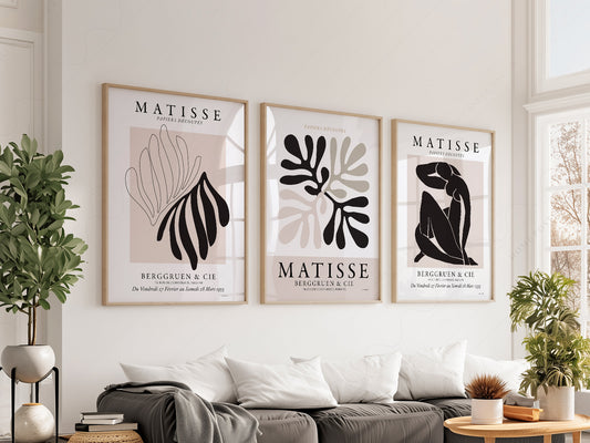 Henri Matisse gallery wall set of three art prints featuring papiers découpés cut-outs in black and beige tones.