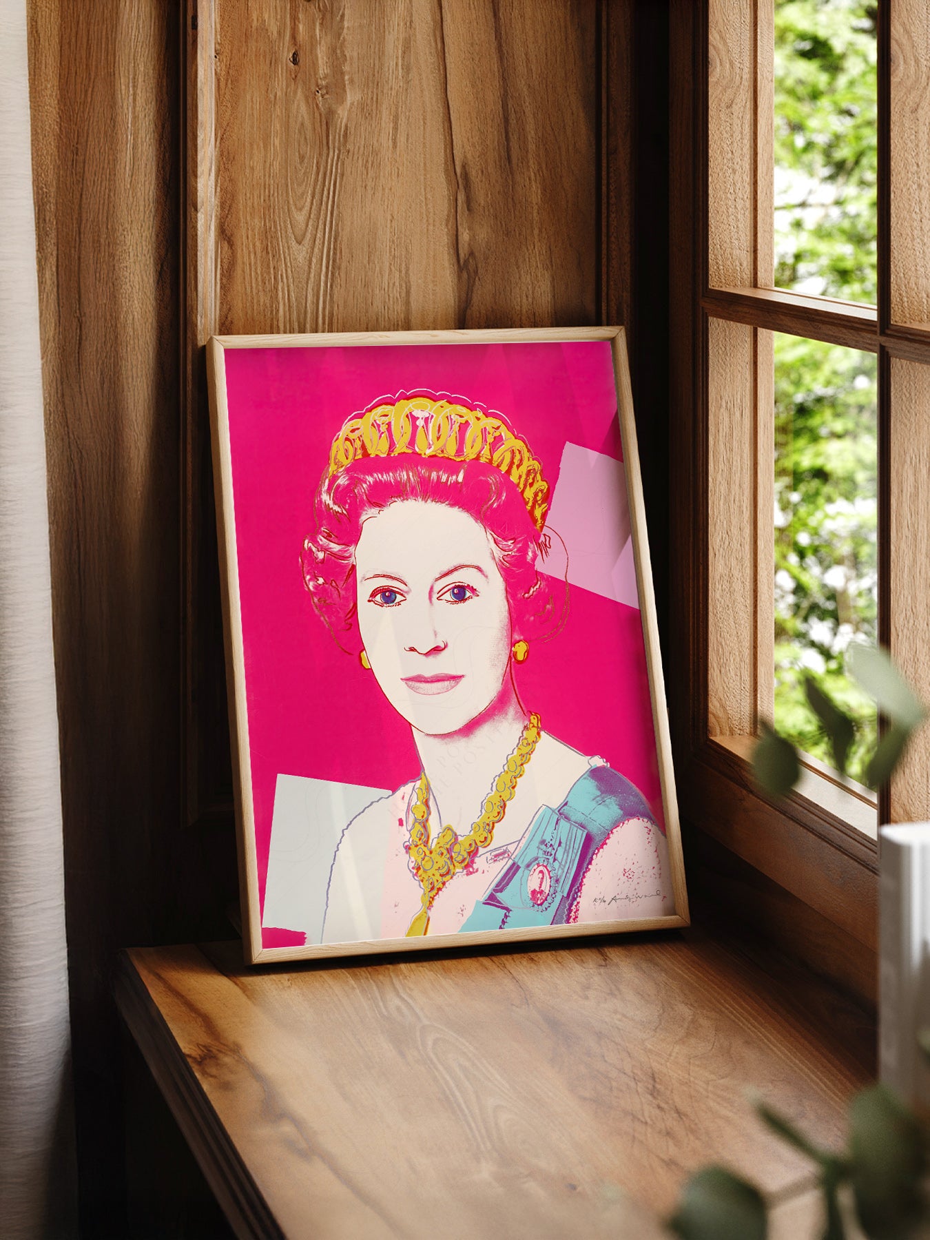Andy Warhol Queen Elizabeth II Pop print styled in a mid-century modern dining room