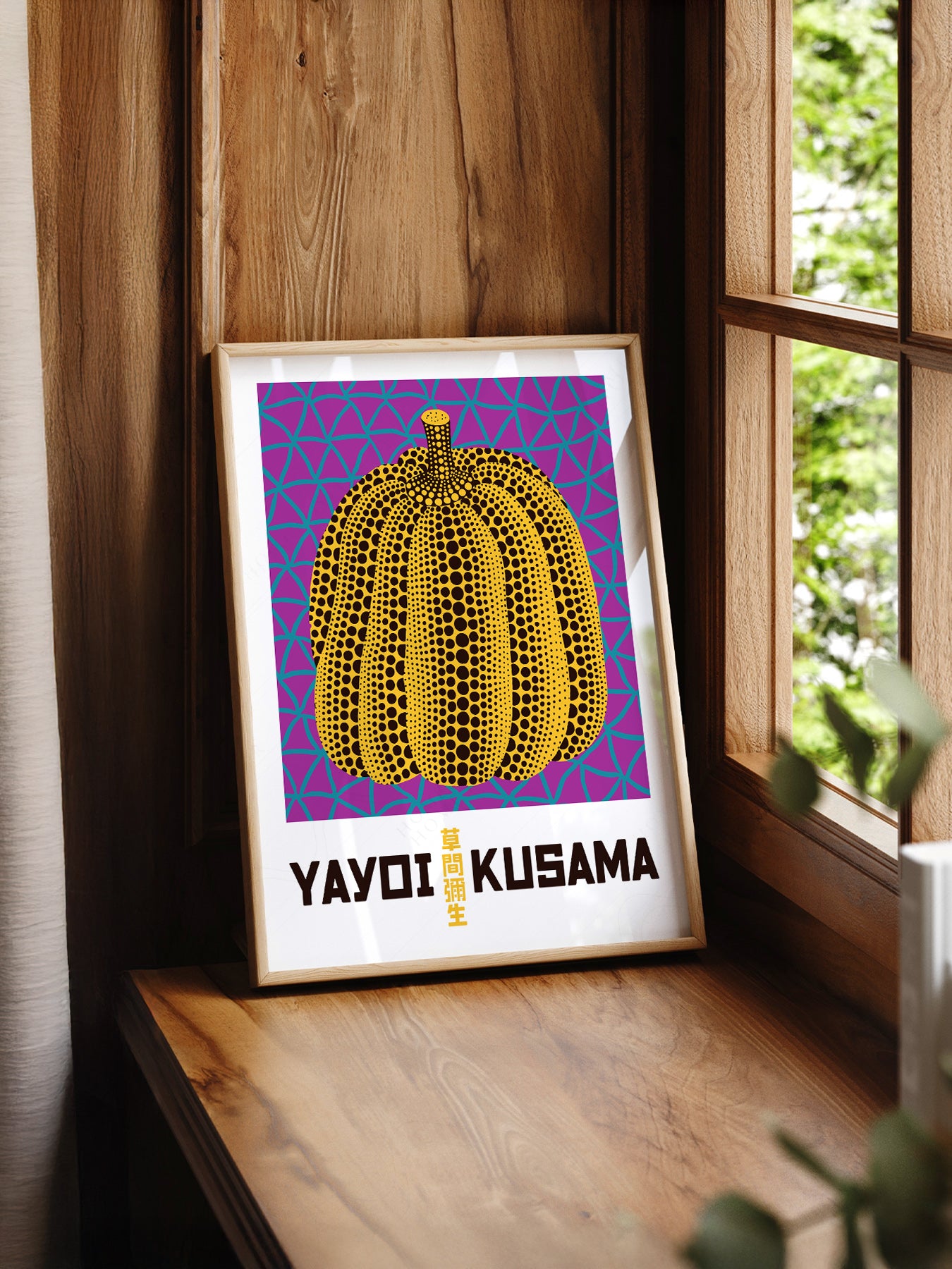 Yayoi Kusama Pumpkin print styled in a mid-century modern dining room