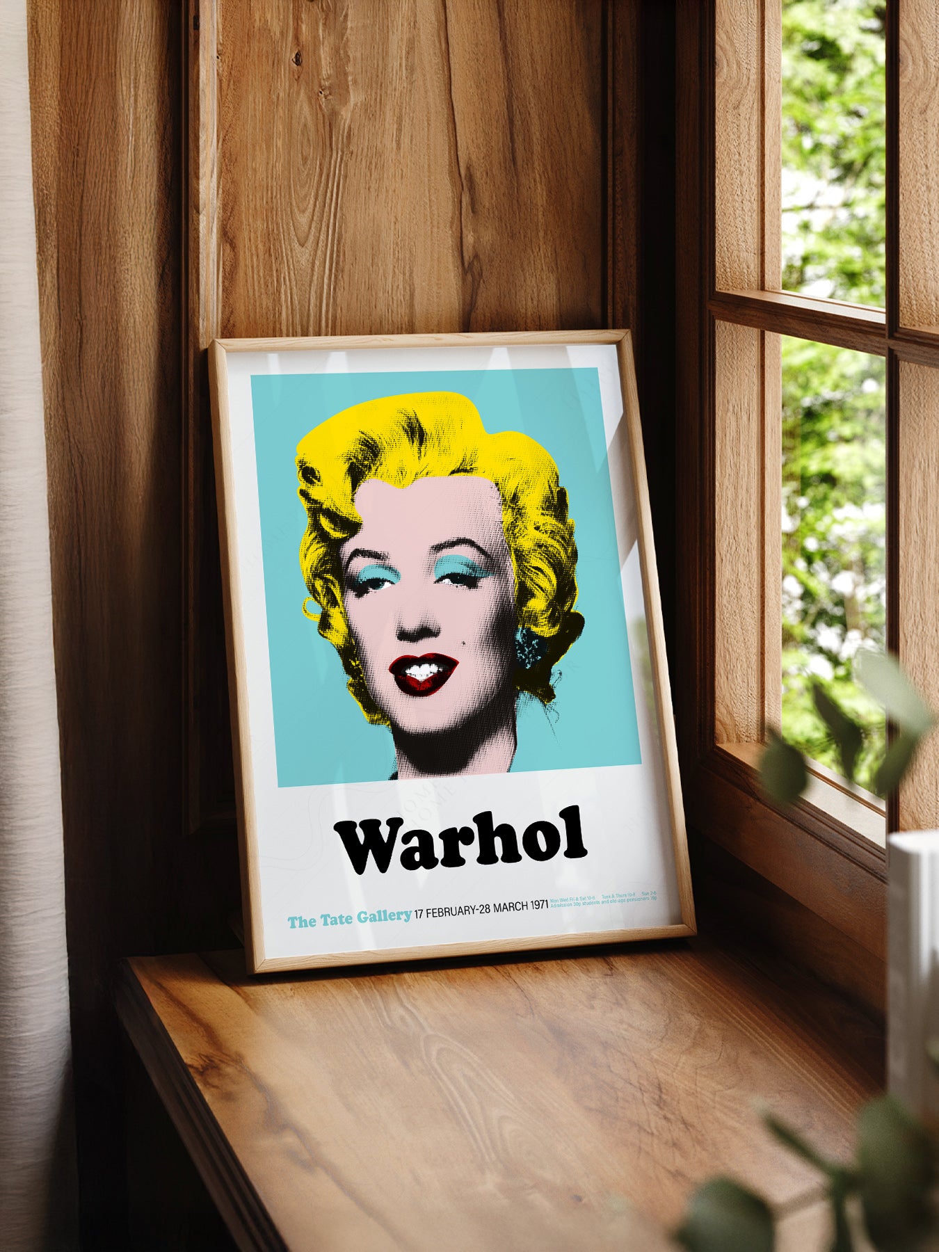 Andy Warhol art print as wall decor in a minimalist home office