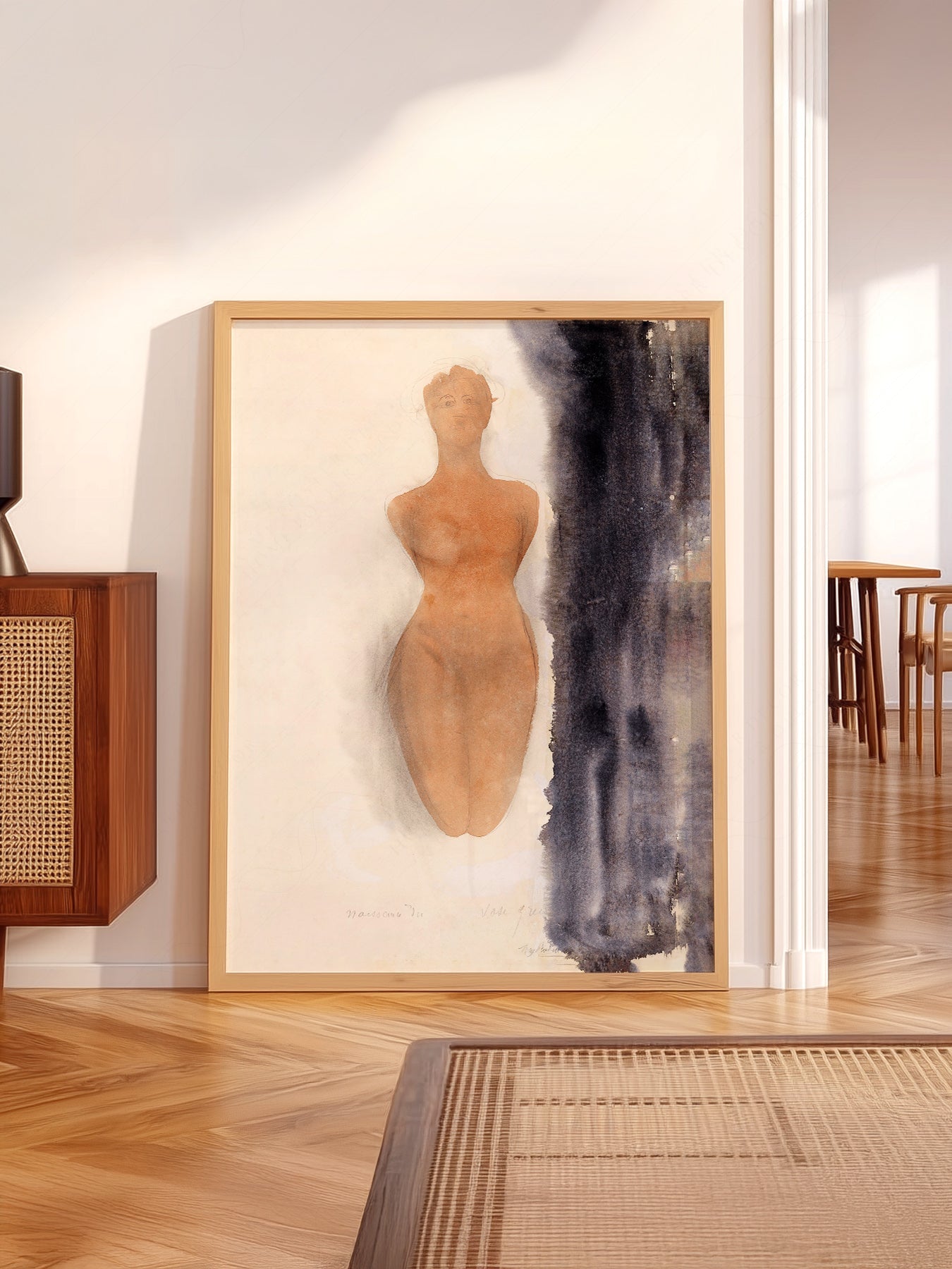 Auguste Rodin wall art in a cozy home study or reading room