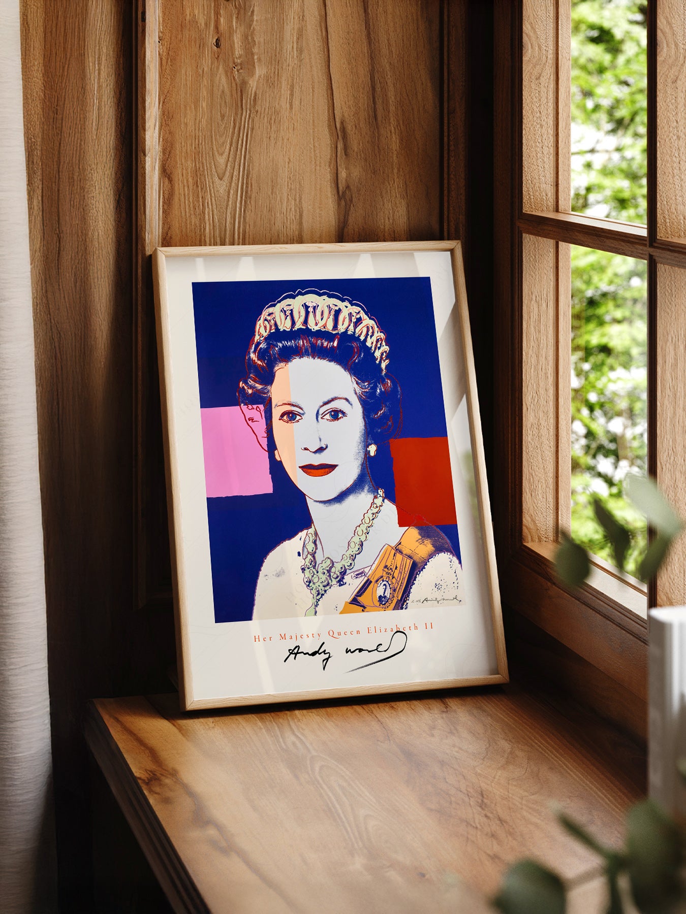 Andy Warhol Queen Elizabeth II Pop print styled in a mid-century modern dining room