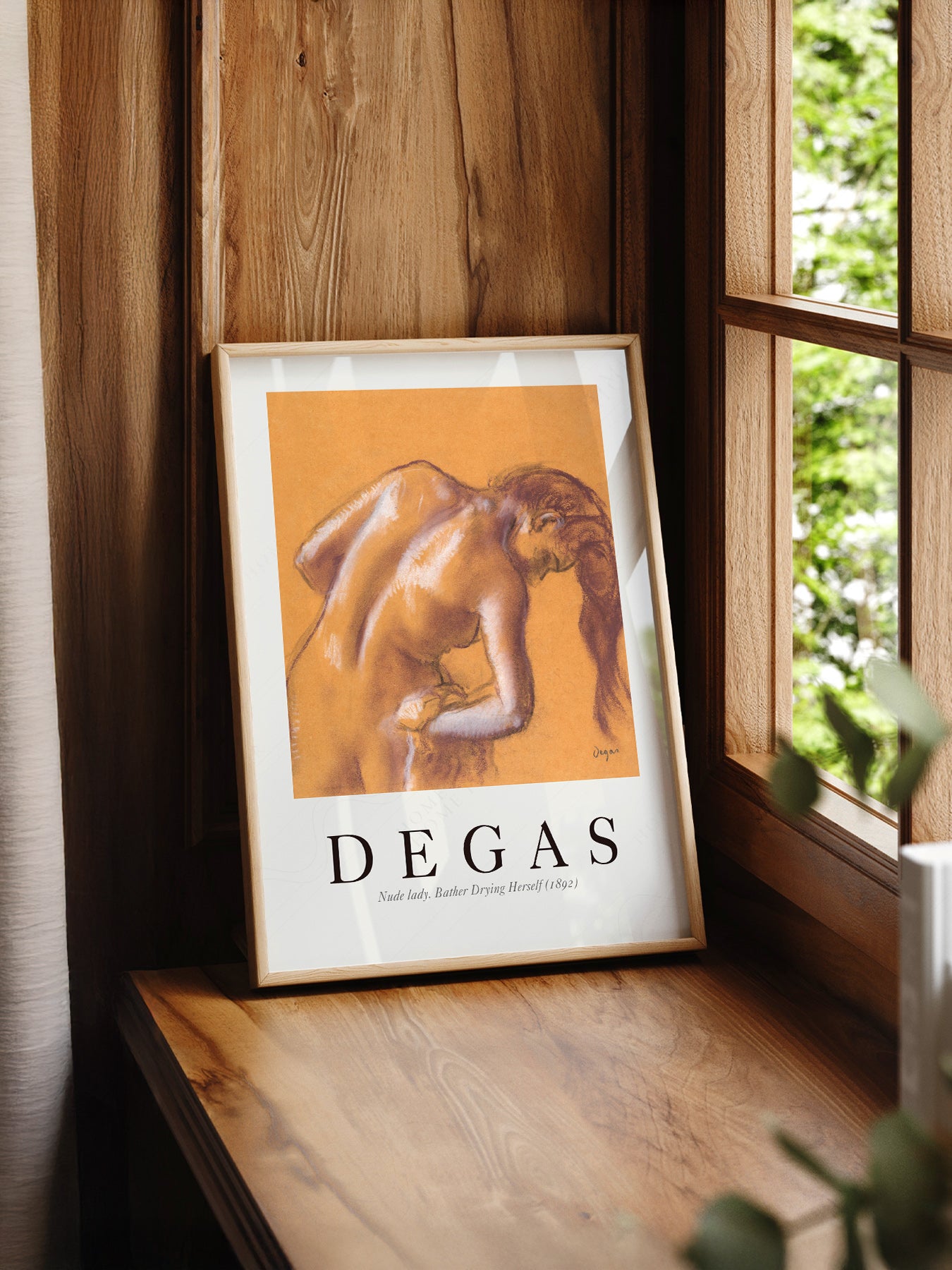 Edgar Degas Bather Drying Herself print styled in a mid-century modern dining room