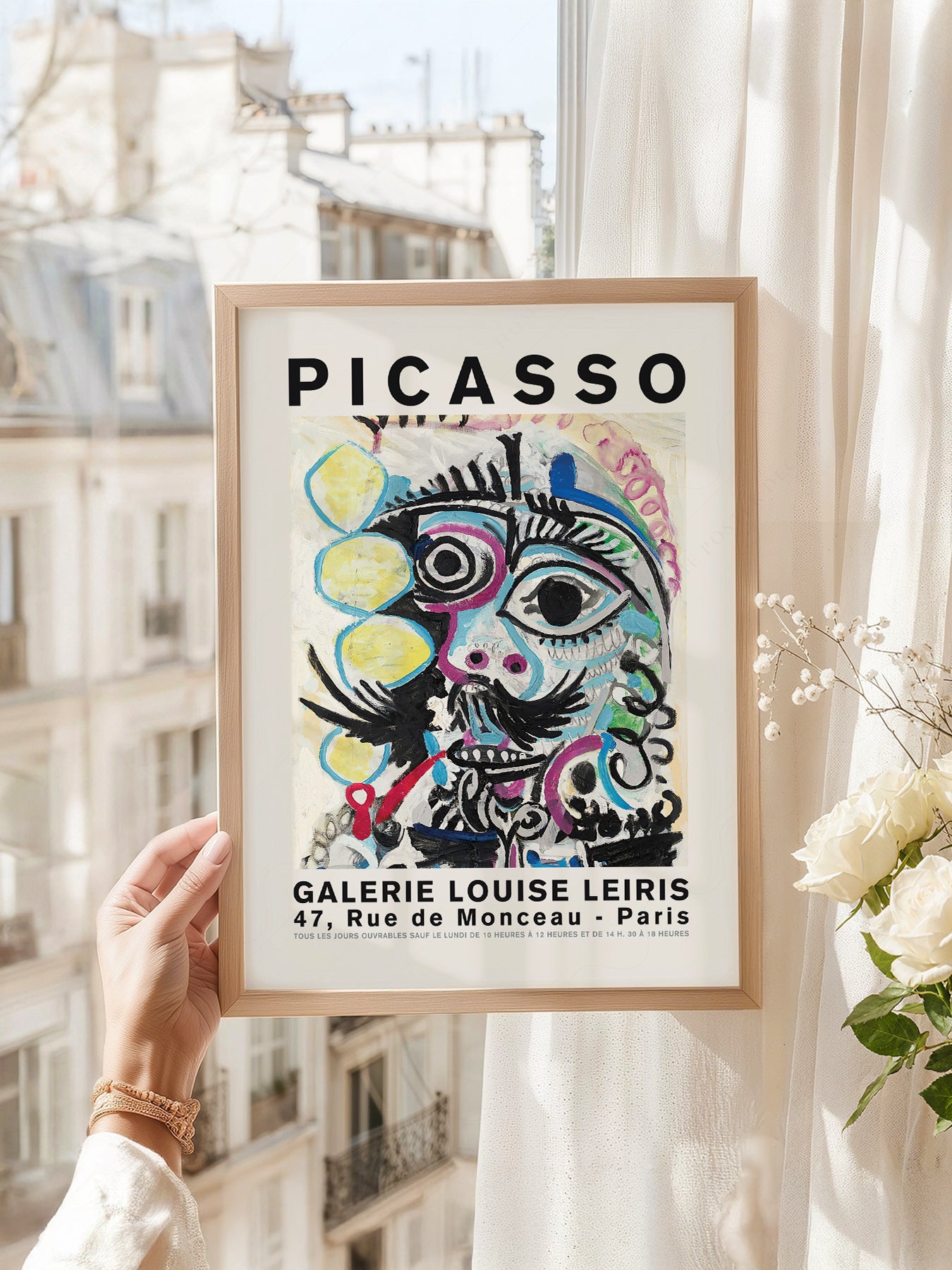 Pablo Picasso art print as wall decor in a minimalist home office