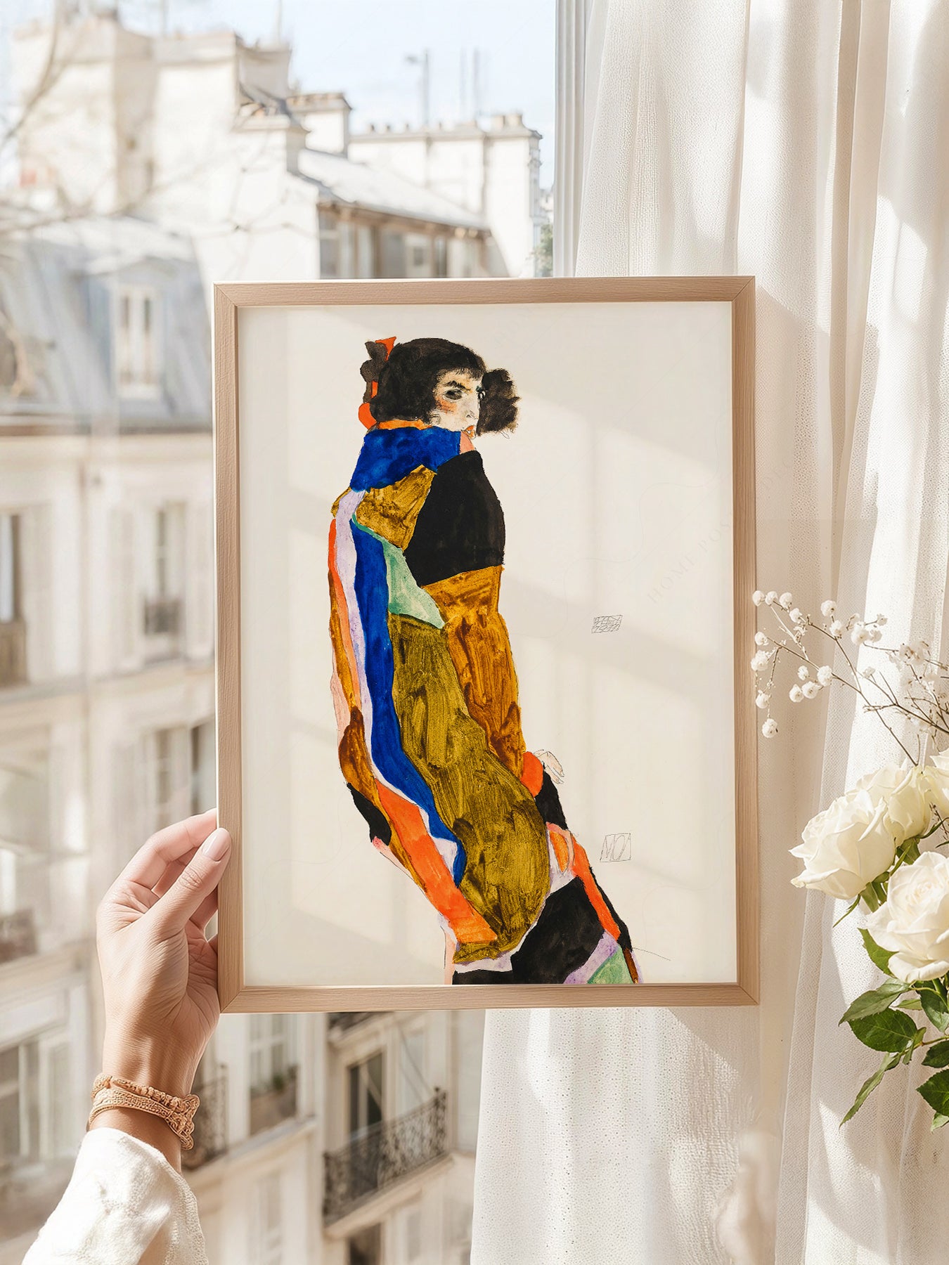 Egon Schiele art print as wall decor in a minimalist home office