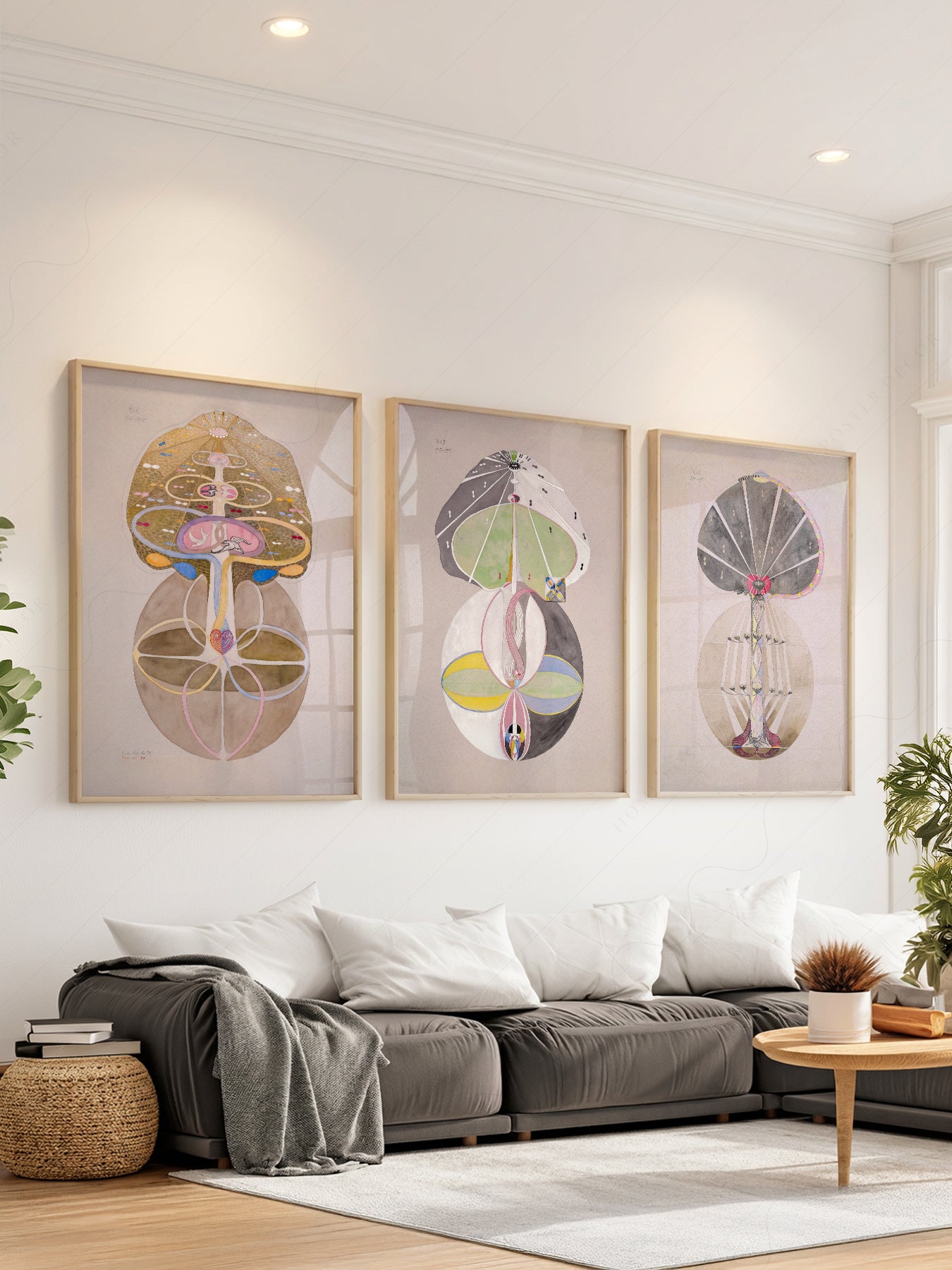 Hilma af Klint The Ten Largest set of three abstract mystical art prints displayed as wall art above a sofa.