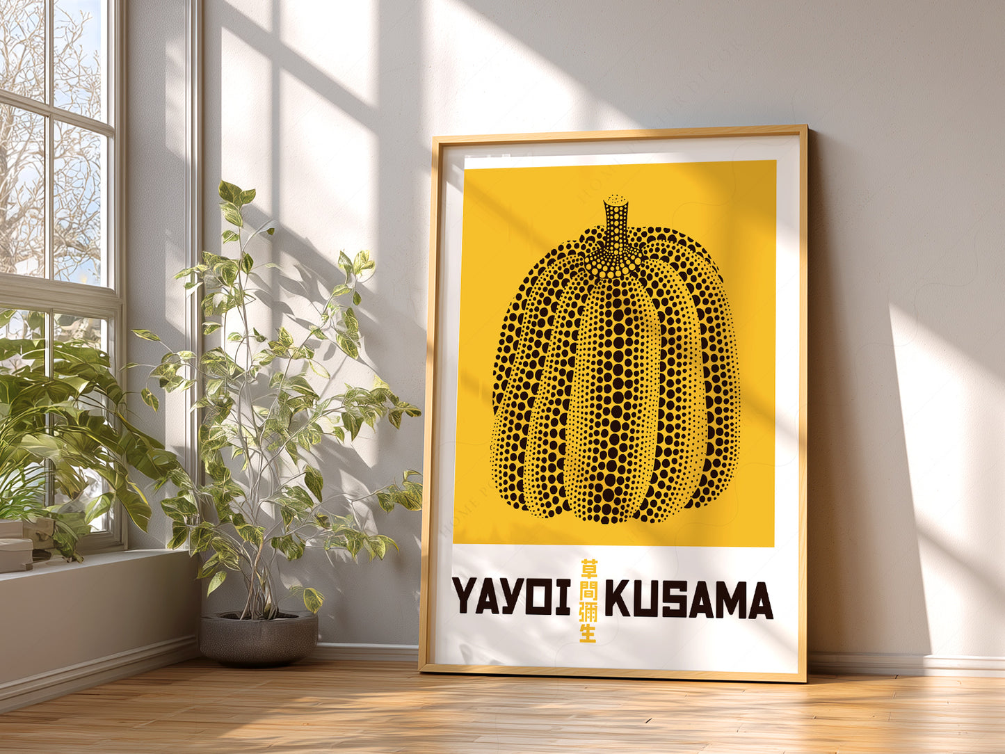 Yayoi Kusama Yellow Pumpkin print styled in a mid-century modern dining room