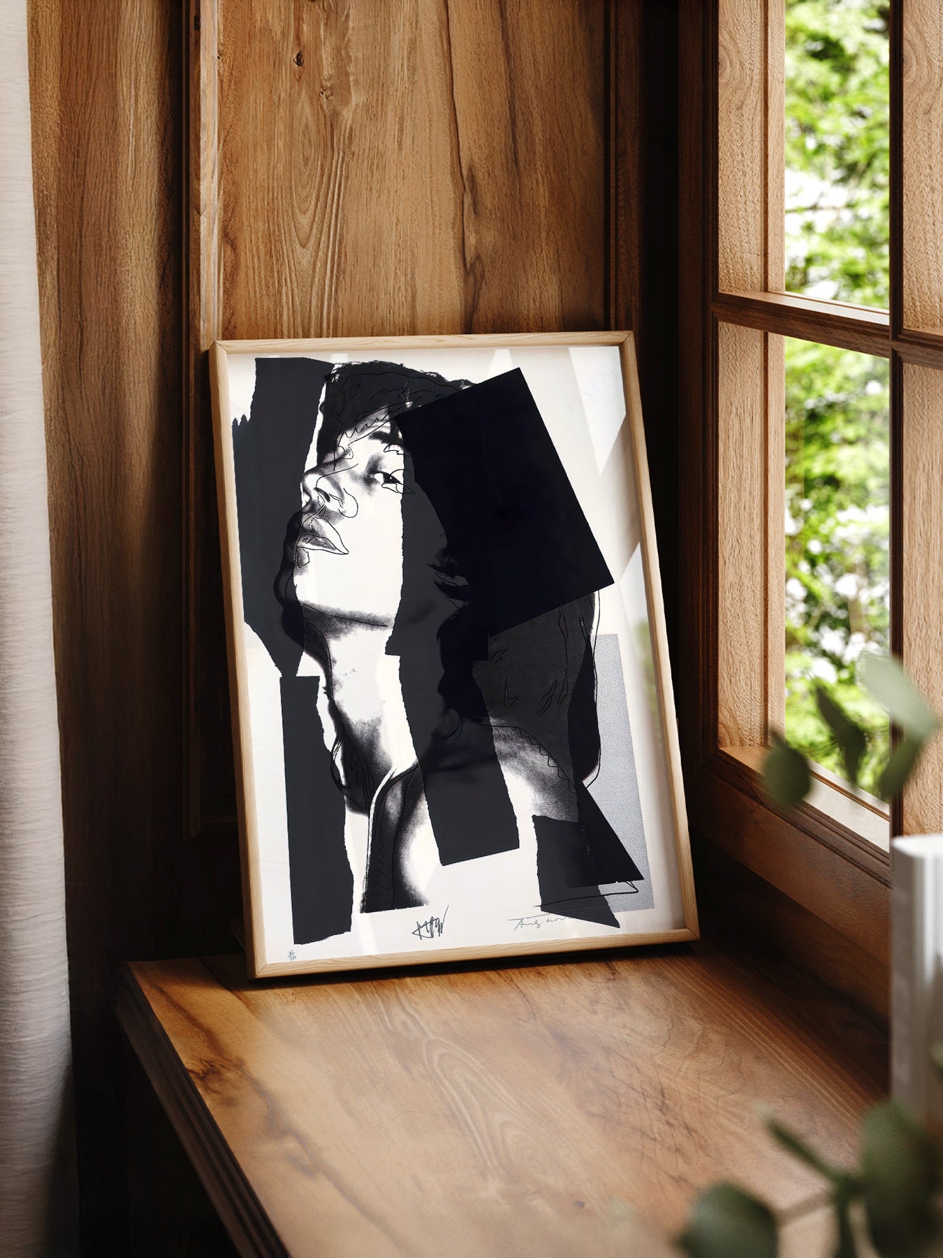 Andy Warhol Mick Jagger Portrait print styled in a mid-century modern dining room