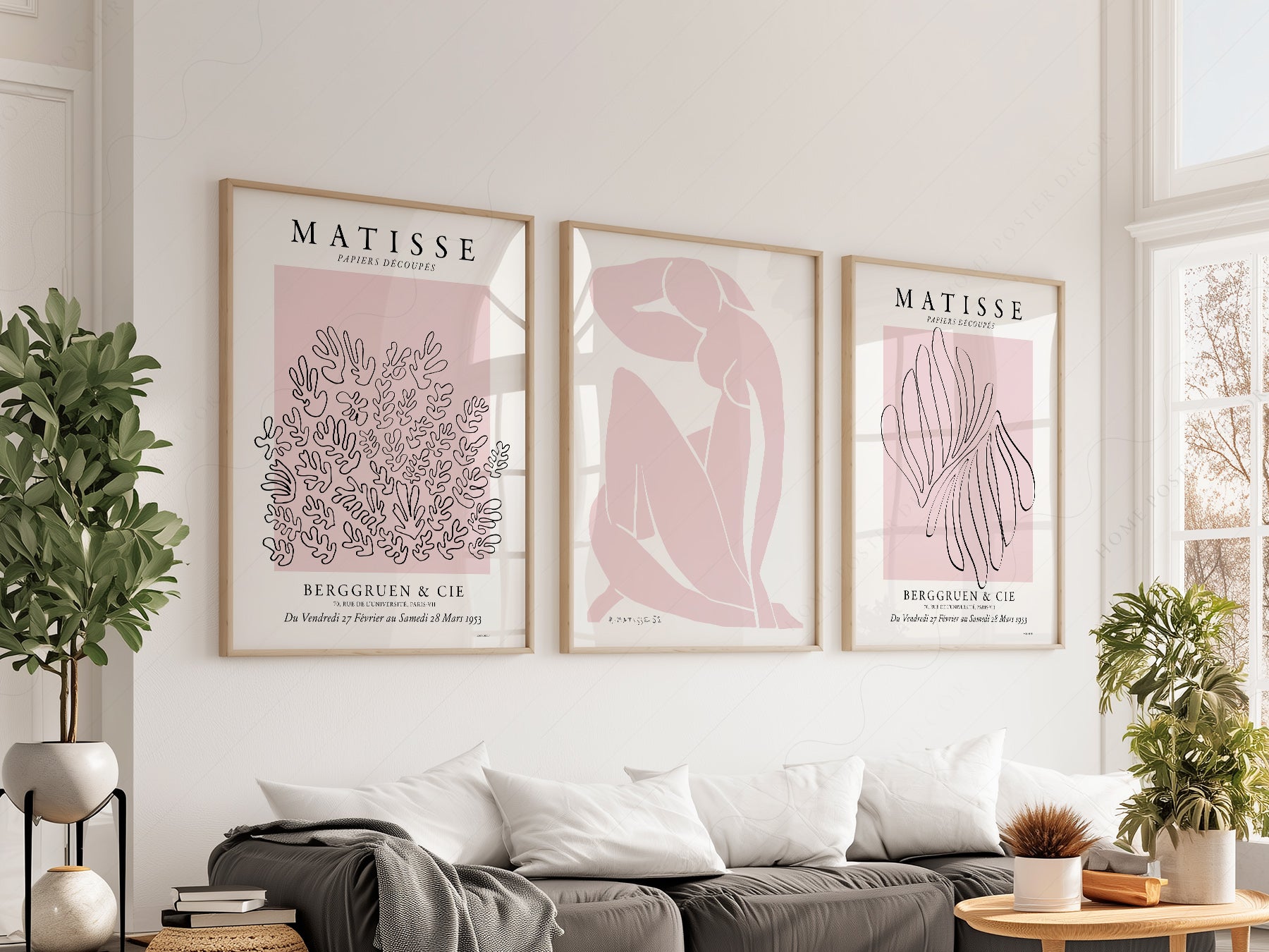 Henri Matisse gallery wall set of three pink art prints featuring cut-out designs and Blue Nude silhouette.