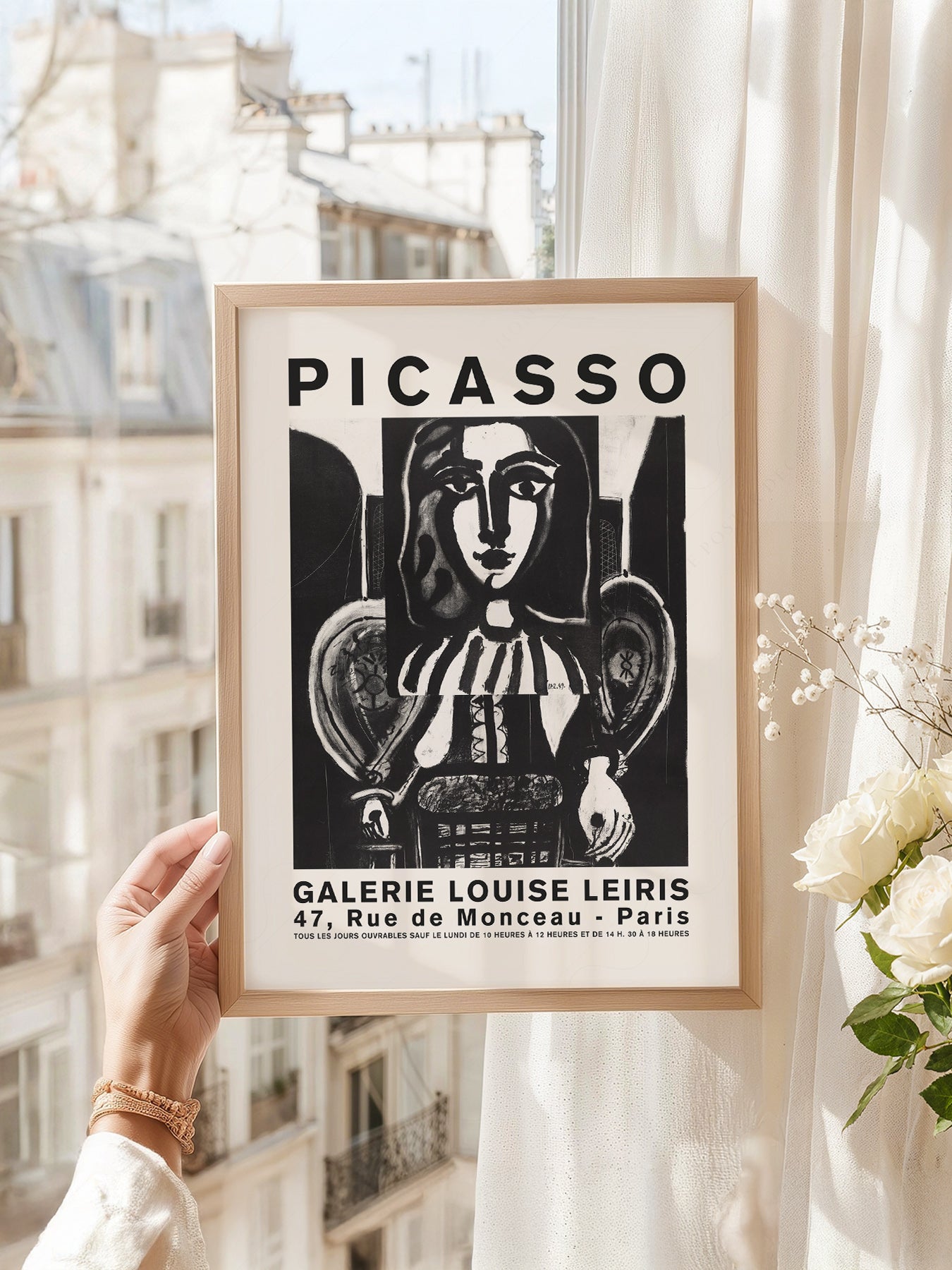 Pablo Picasso art print as wall decor in a minimalist home office