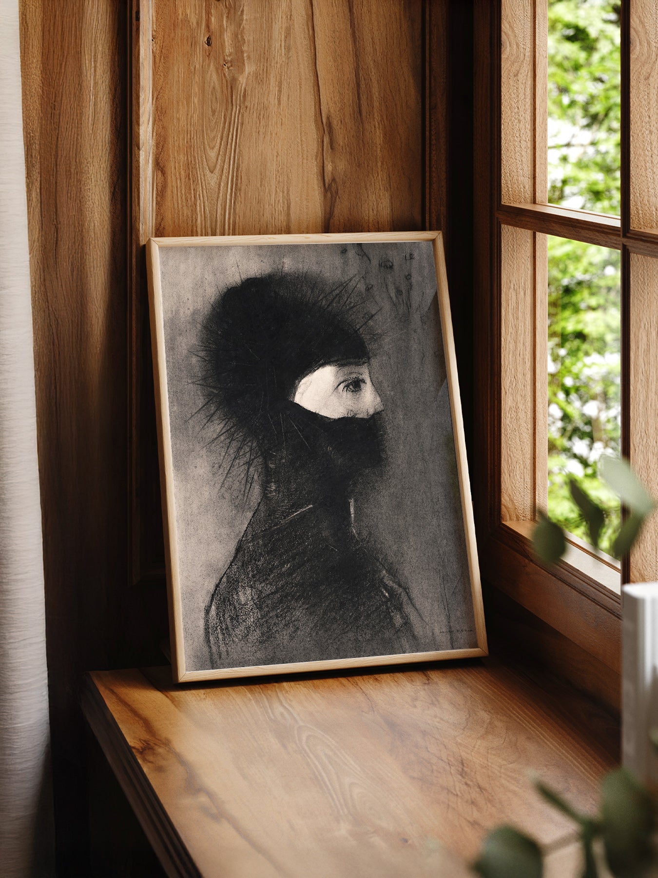 Odilon Redon Armor 1891 print styled in a mid-century modern dining room