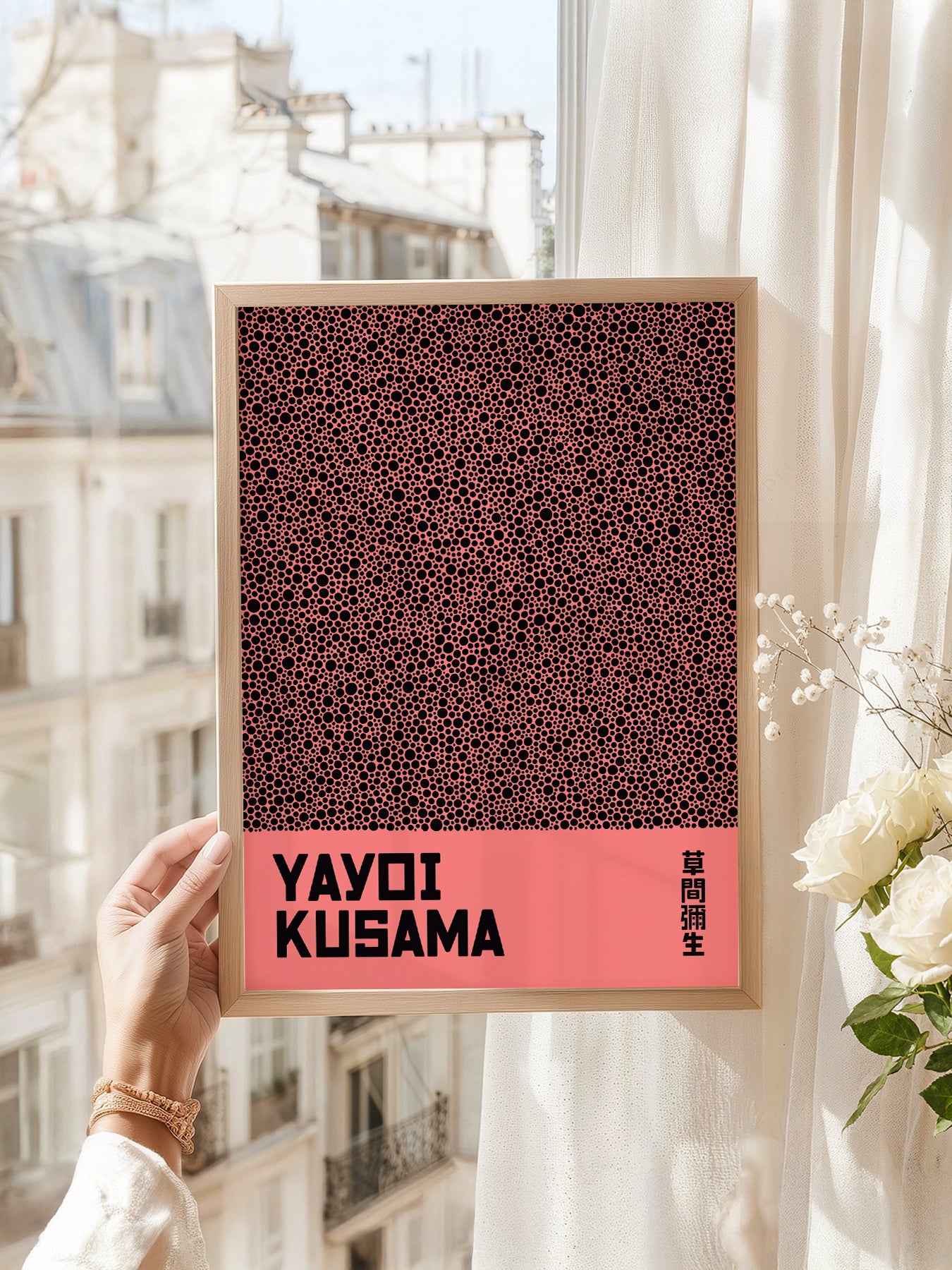 Yayoi Kusama art print as wall decor in a minimalist home office