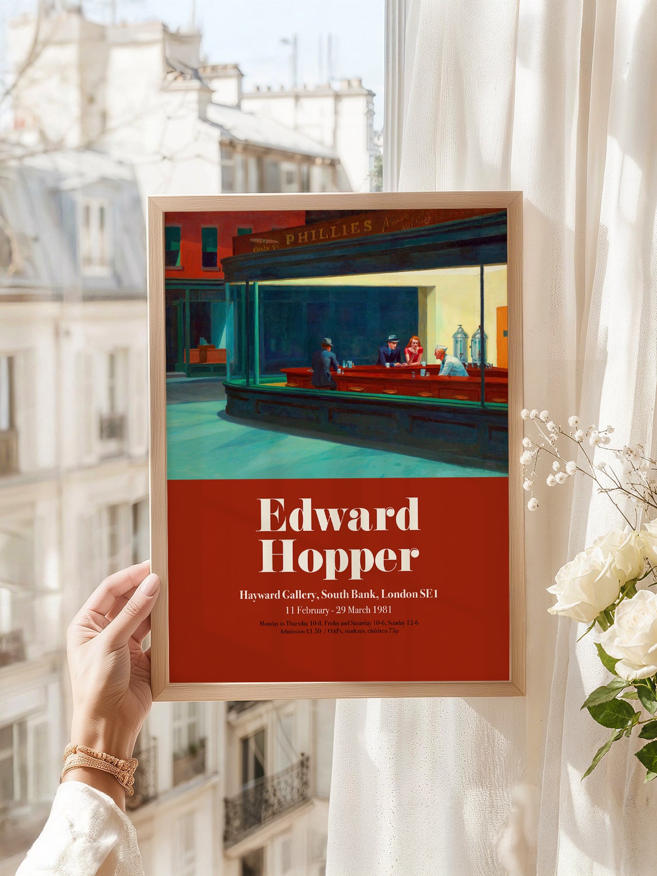 Edward Hopper art print as wall decor in a minimalist home office