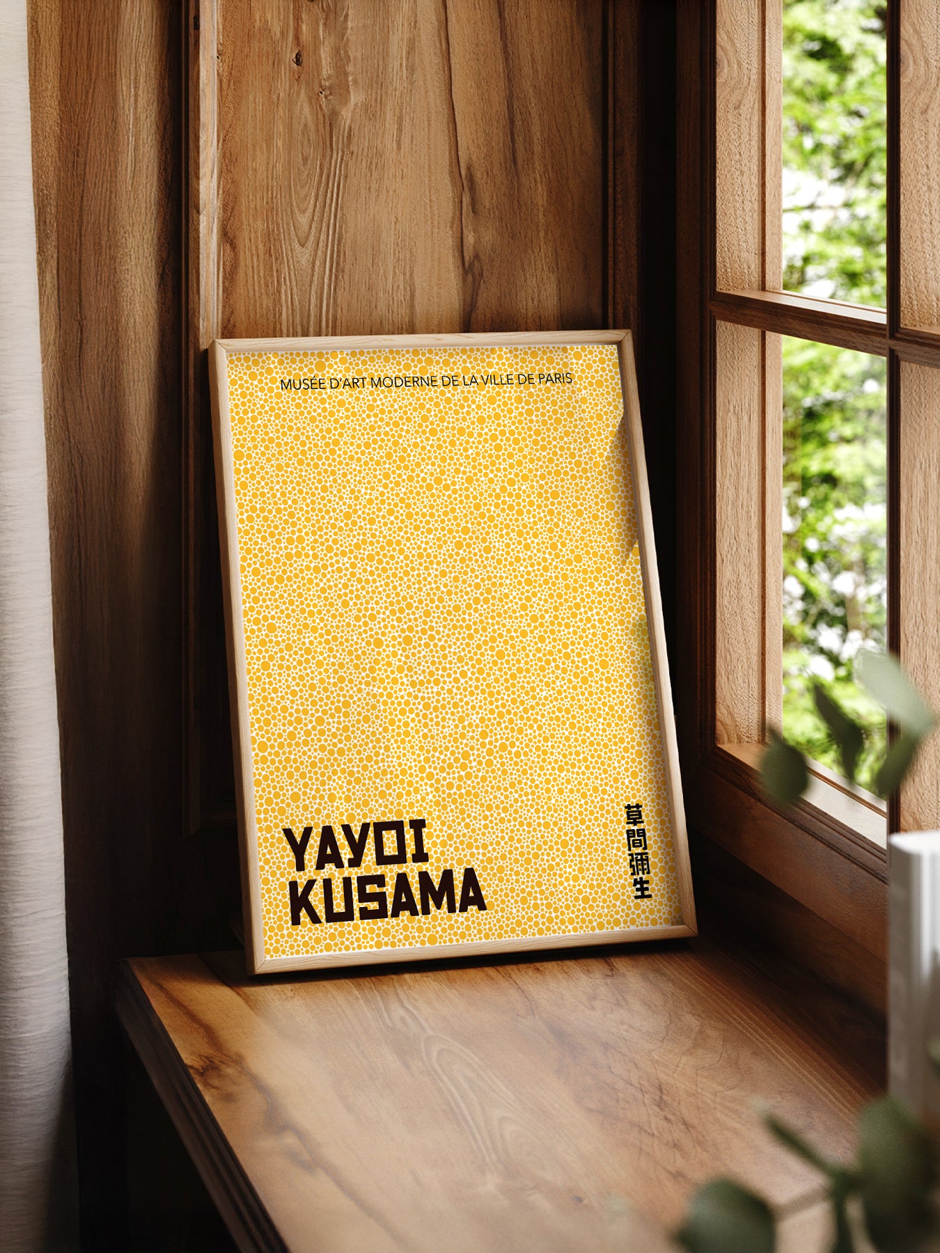 Yayoi Kusama Yellow Dots Exhibition print styled in a mid-century modern dining room