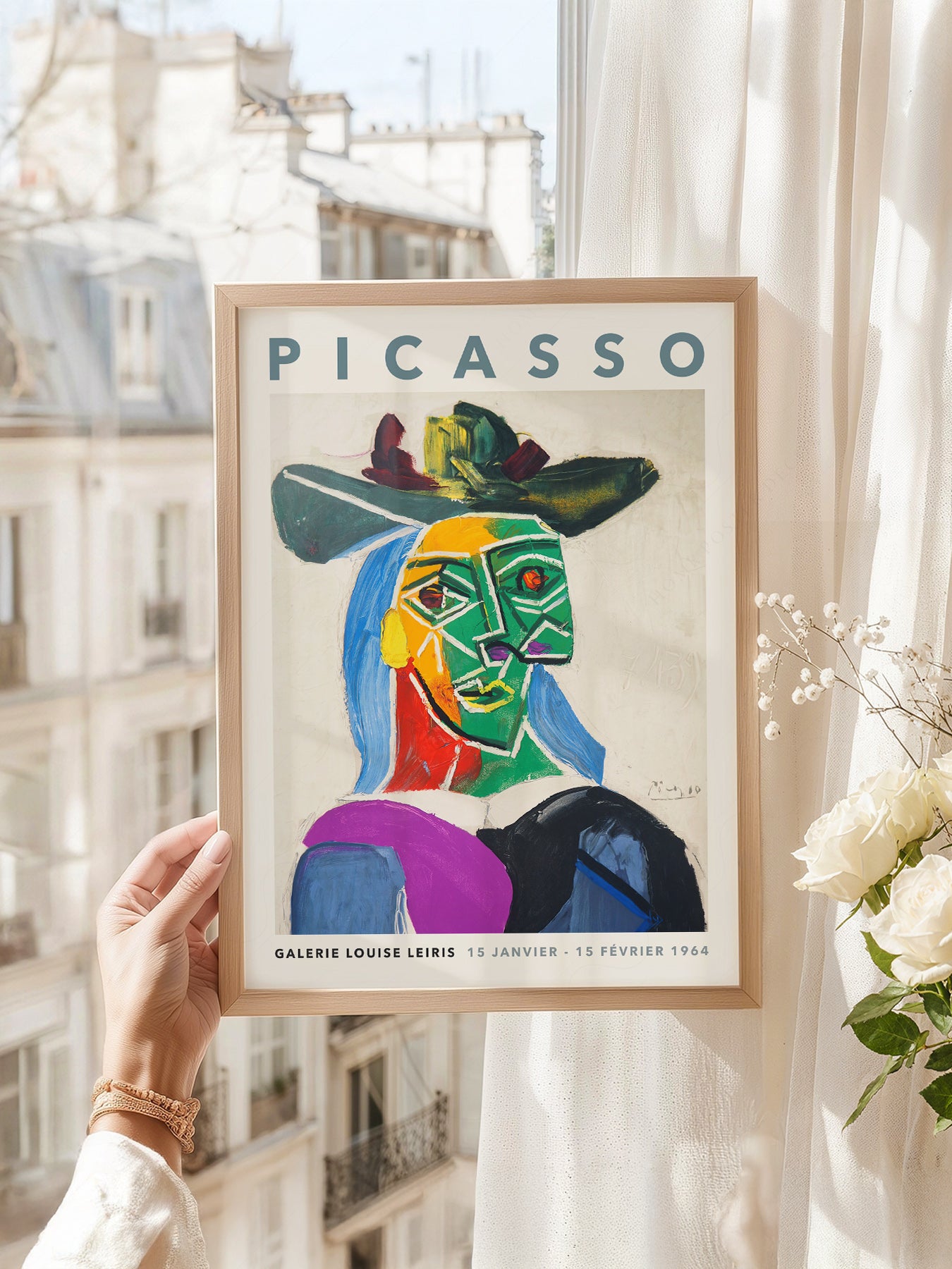 Pablo Picasso art print as wall decor in a minimalist home office