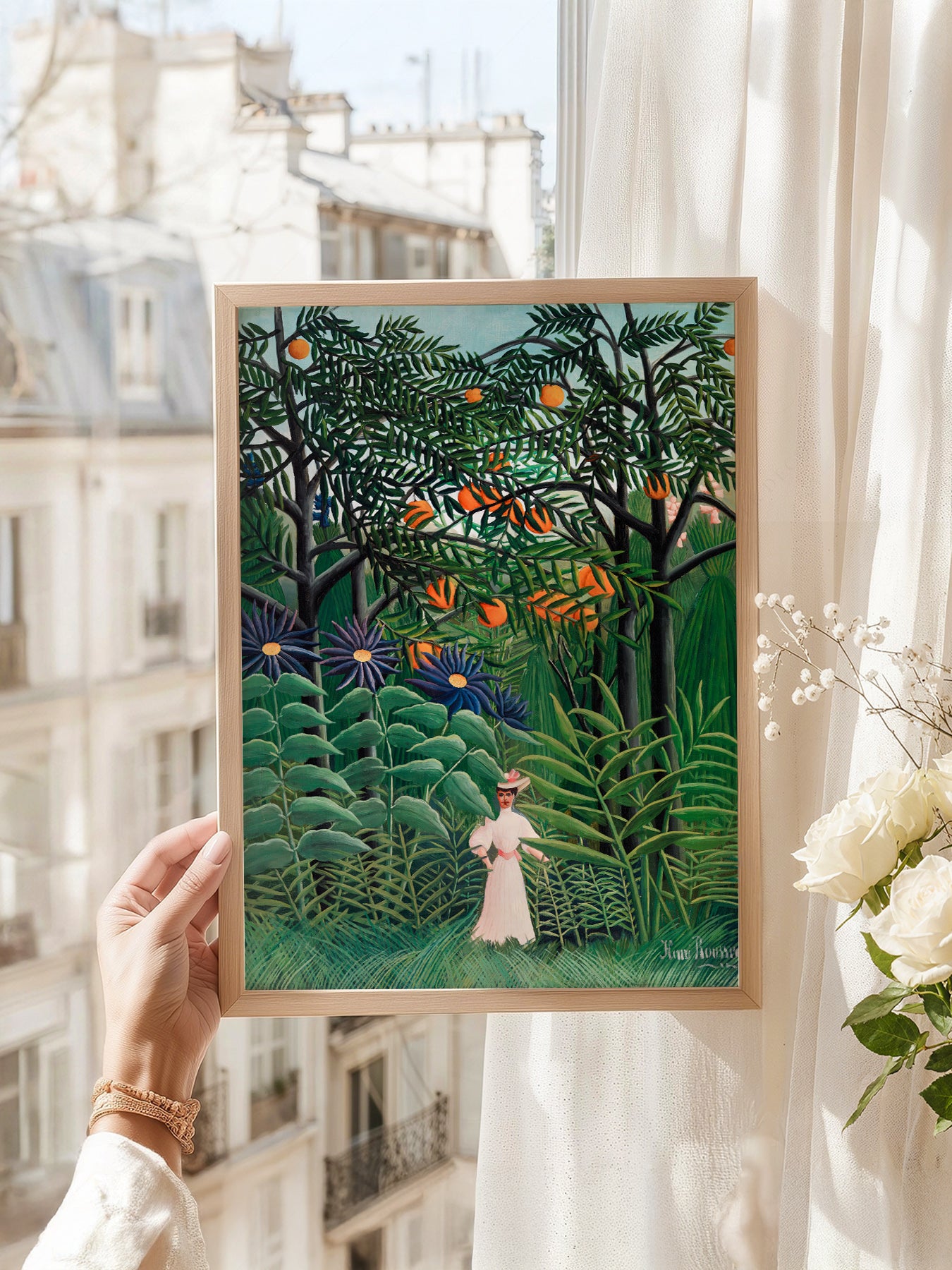 Henri Rousseau art print as wall decor in a minimalist home office
