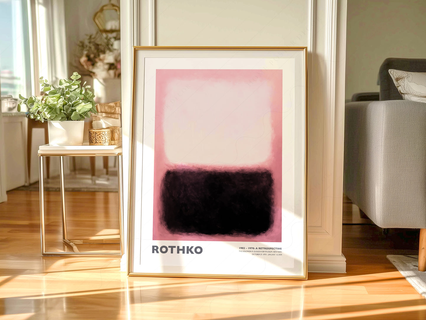 Mark Rothko Pink and Black Exhibition print styled in a mid-century modern dining room