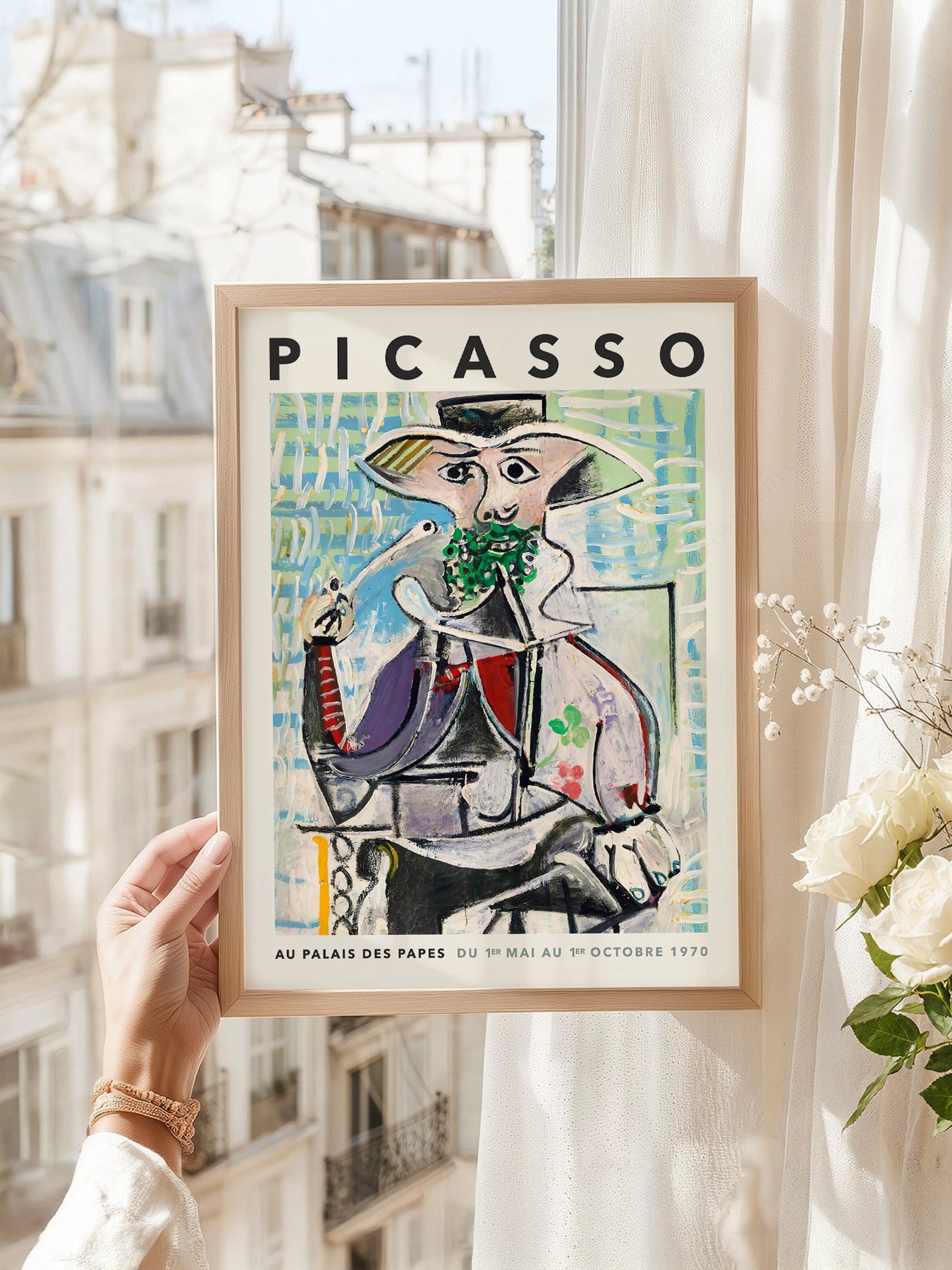 Pablo Picasso art print as wall decor in a minimalist home office