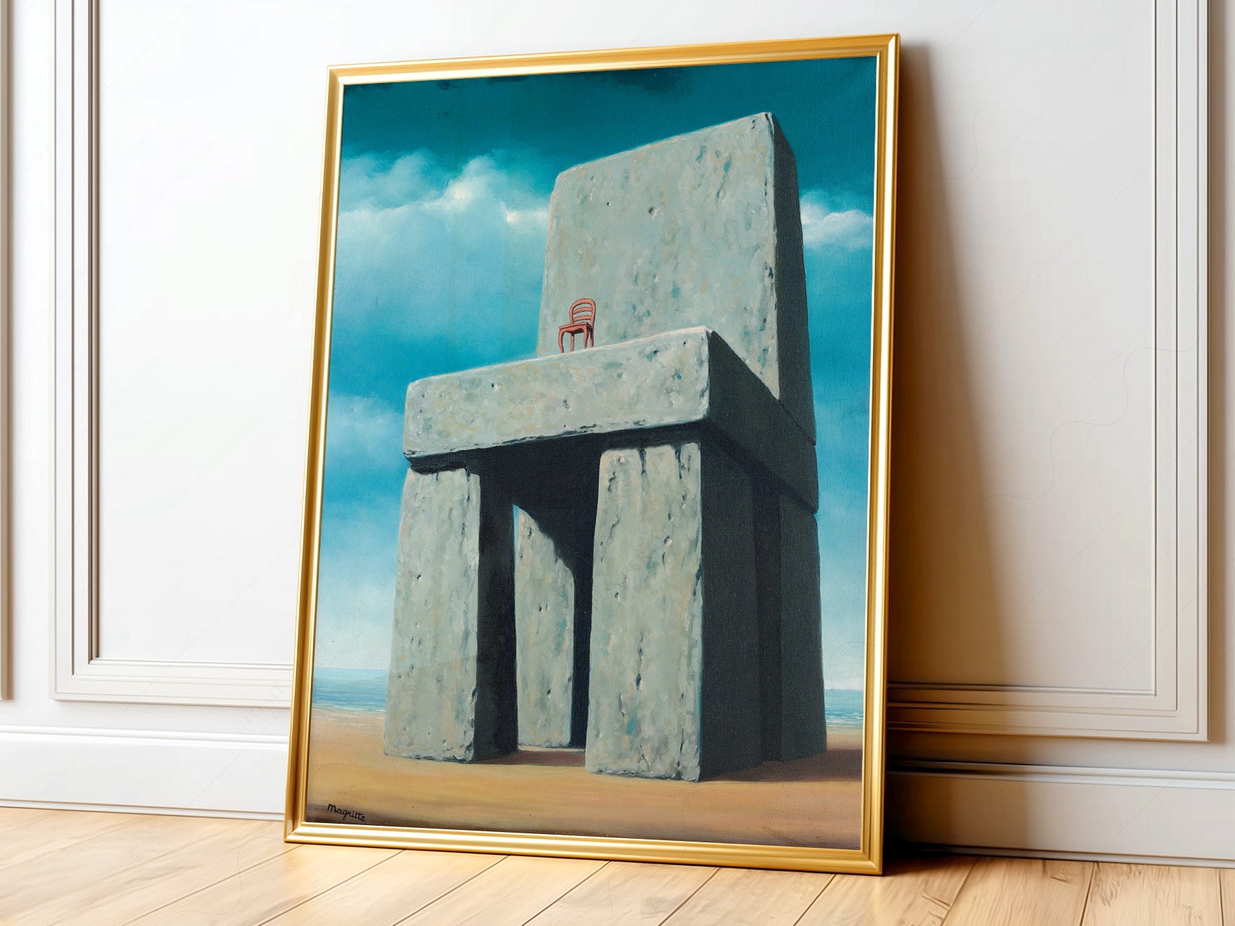 René Magritte The Legend of the Centuries surrealist art print with stone chair and tiny red chair against blue sky.