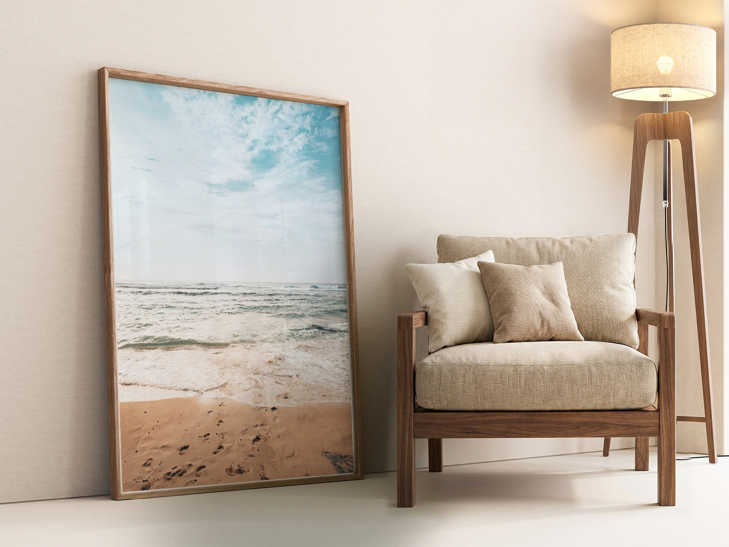 Coastal Serenity beach photography wall art print featuring gentle ocean waves and sandy shoreline with footprints.