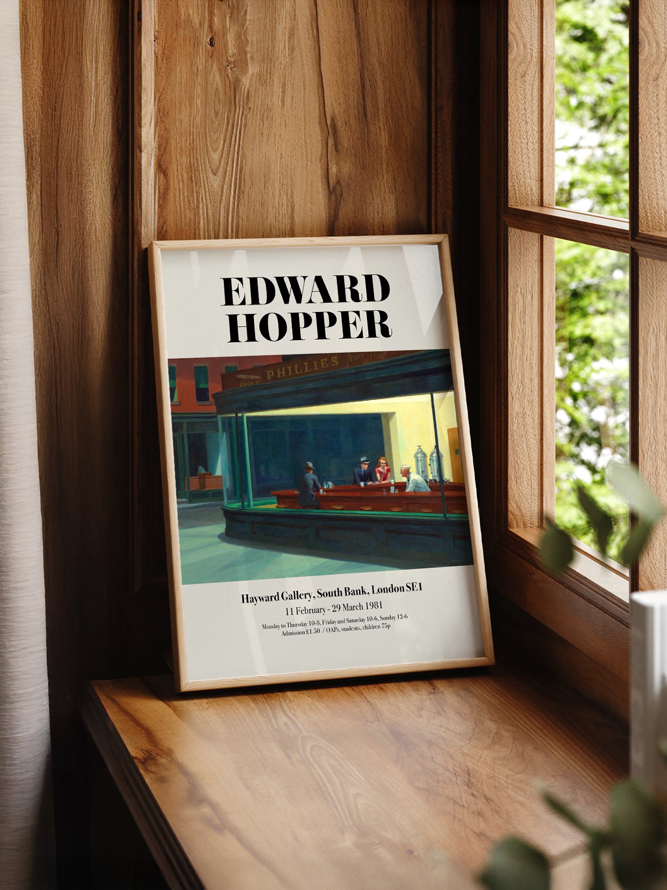 Edward Hopper Nighthawks Exhibition print styled in a mid-century modern dining room