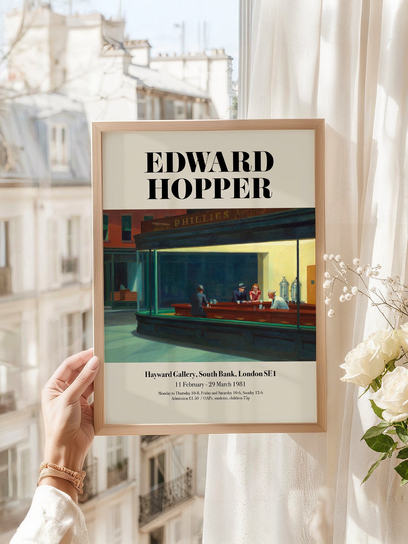 Edward Hopper art print as wall decor in a minimalist home office
