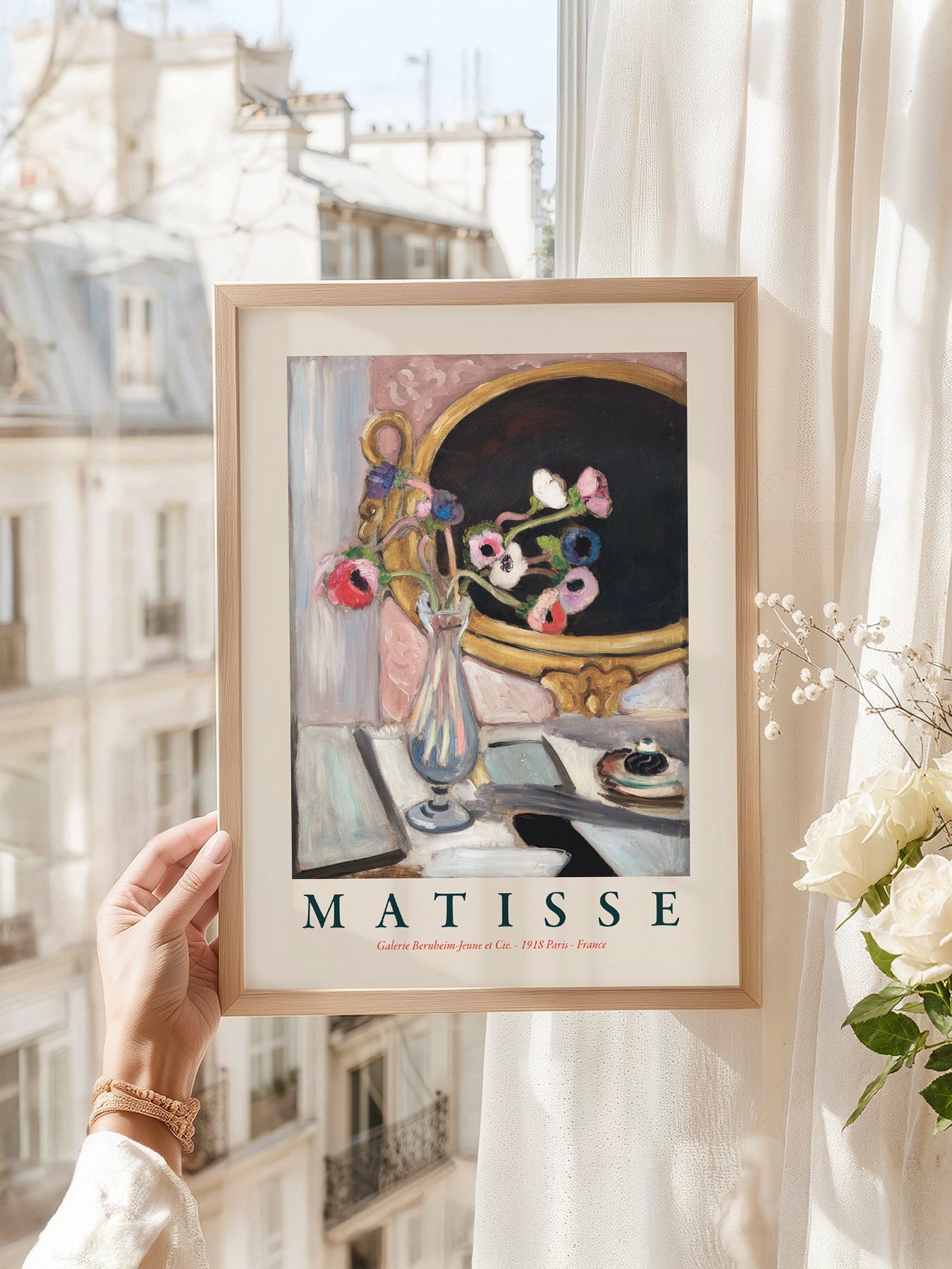 Henri Matisse art print as wall decor in a minimalist home office