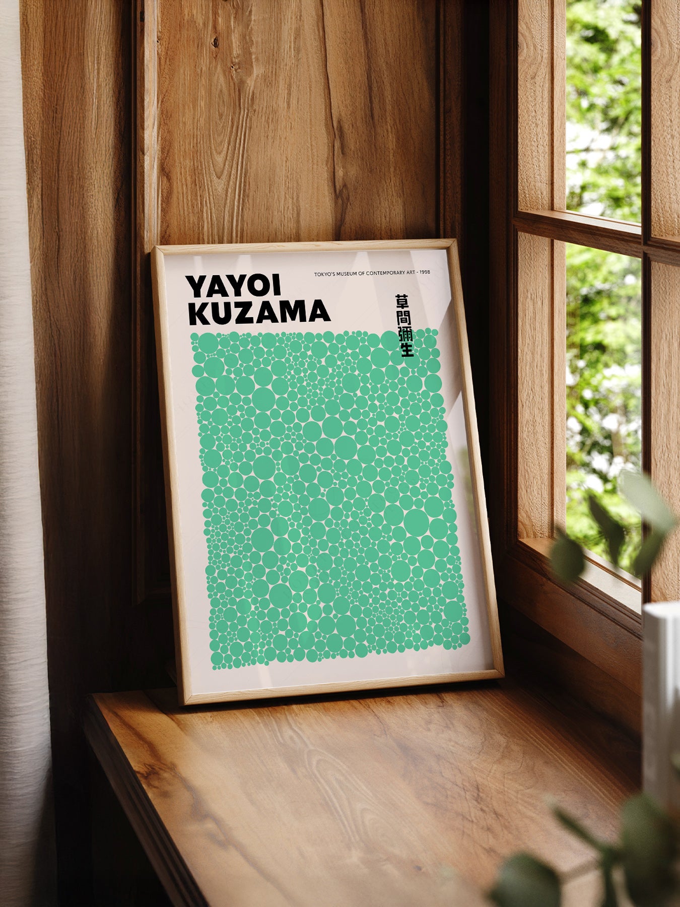 Yayoi Kusama Green Dots Exhibition print styled in a mid-century modern dining room