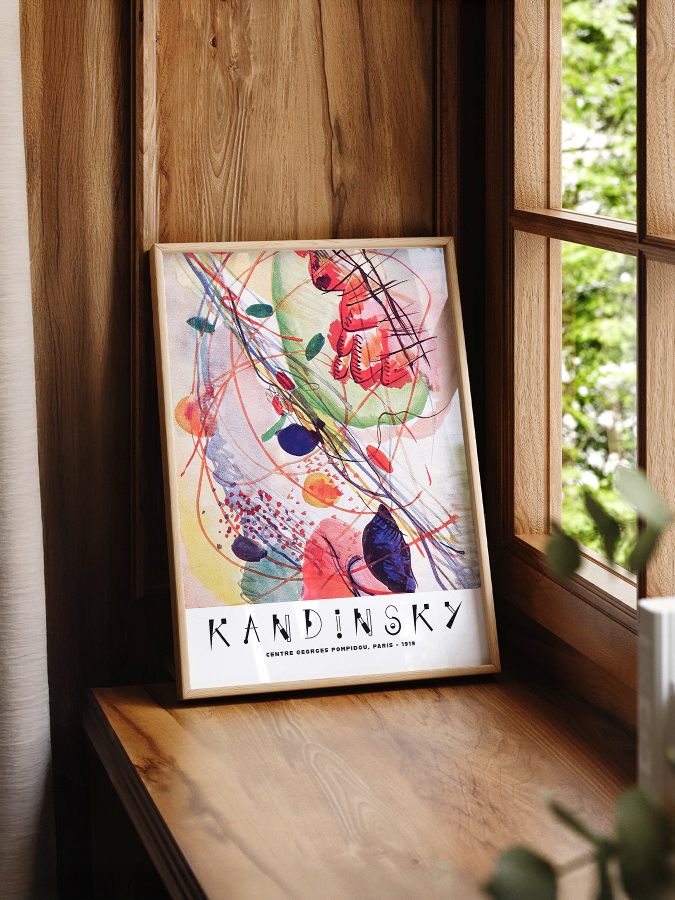 Wassily Kandinsky Abstract print styled in a mid-century modern dining room