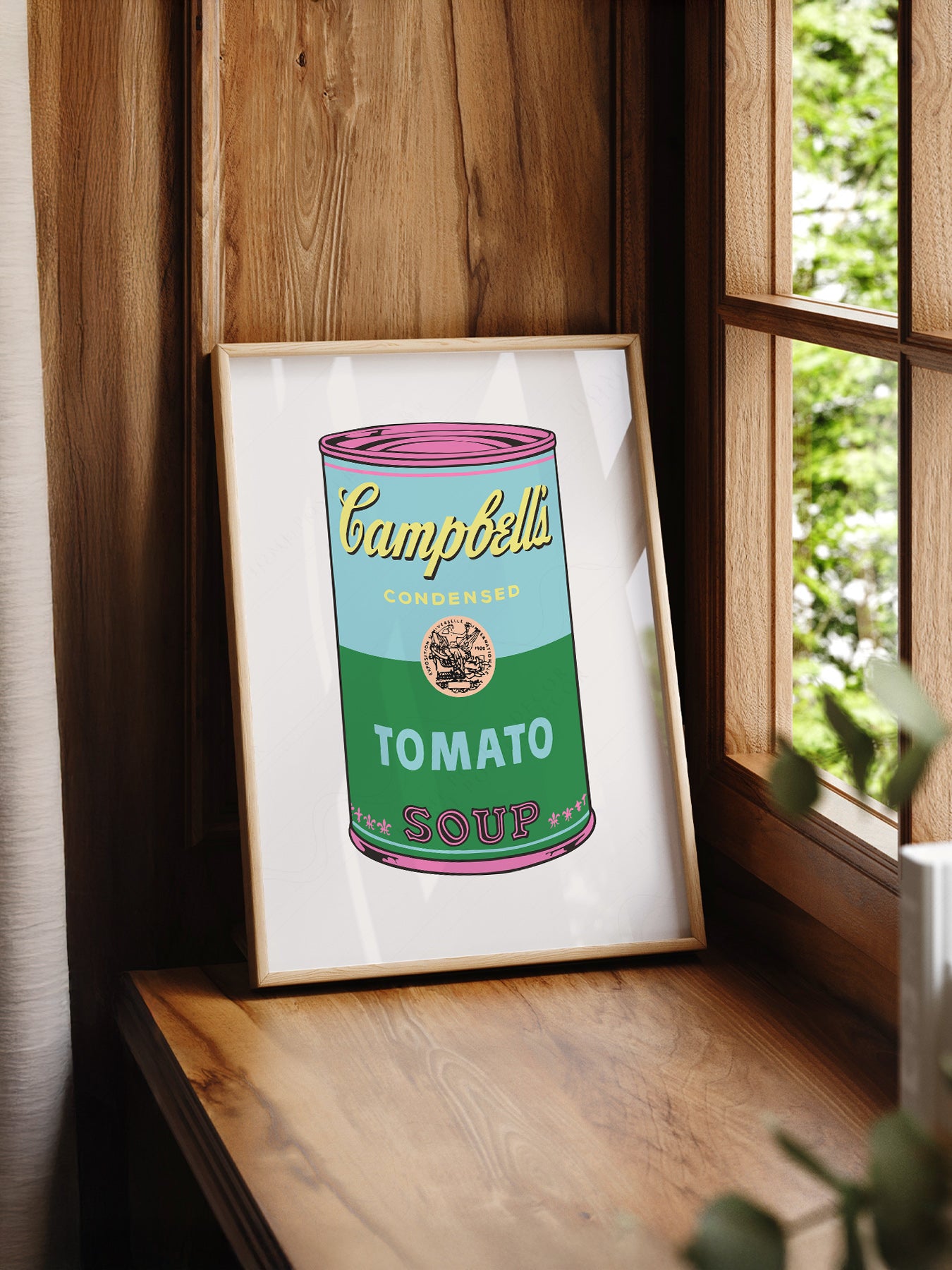 Andy Warhol Campbell's Soup Can print styled in a mid-century modern dining room