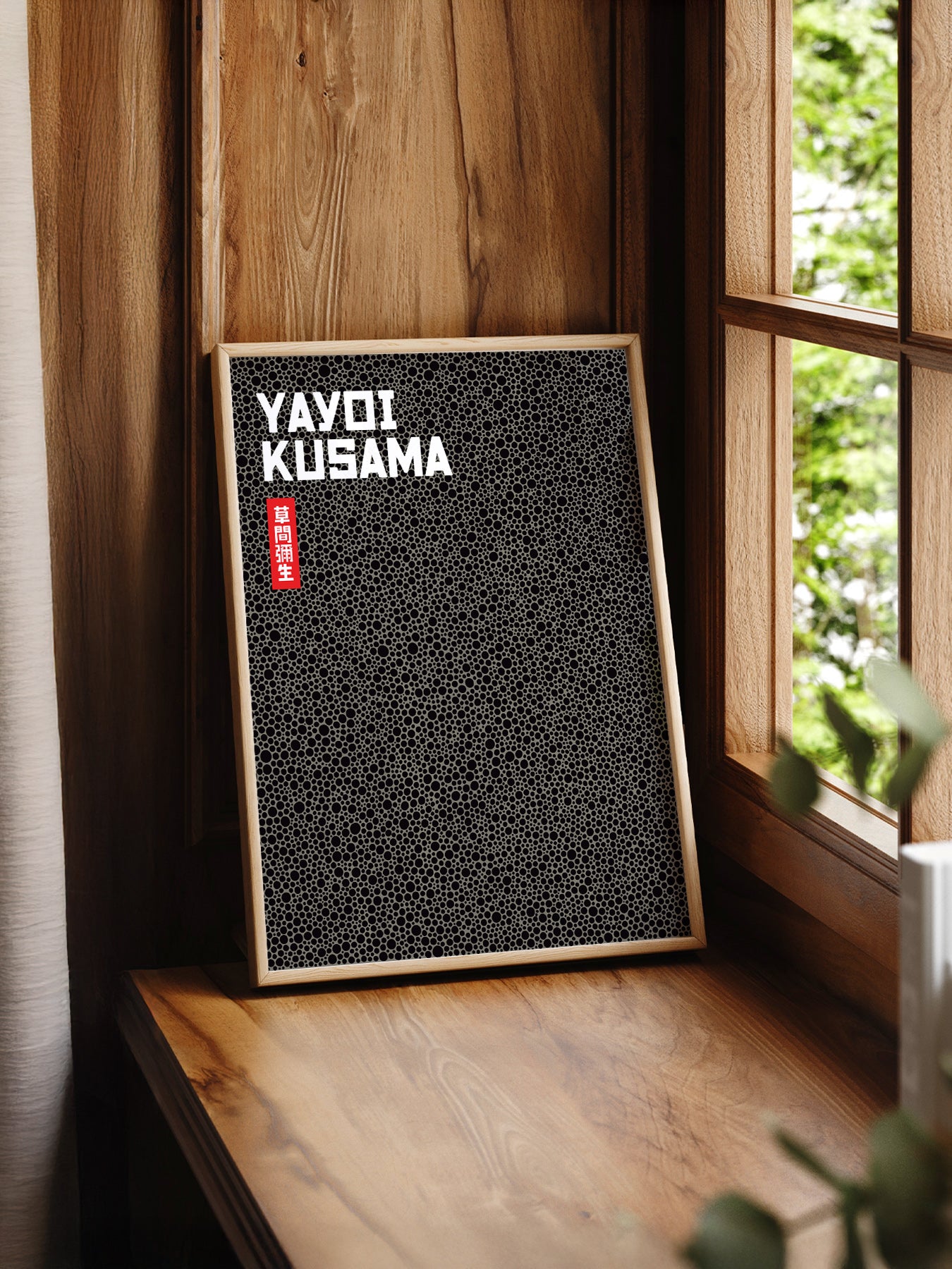 Yayoi Kusama Black Dots print styled in a mid-century modern dining room