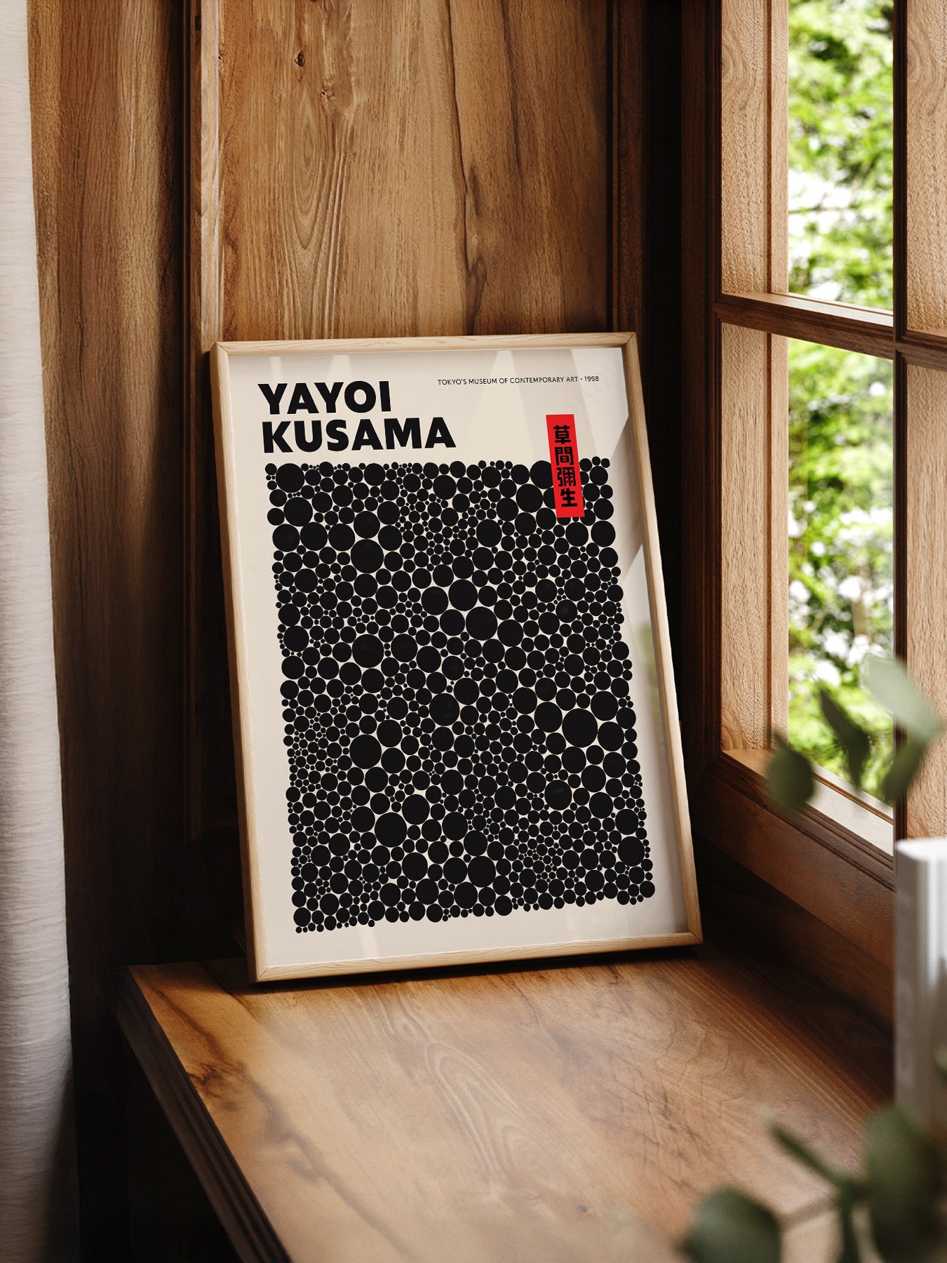 Yayoi Kusama Dots Exhibition print styled in a mid-century modern dining room