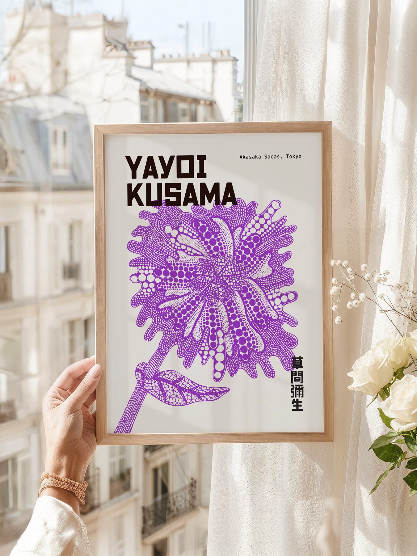 Yayoi Kusama art print as wall decor in a minimalist home office