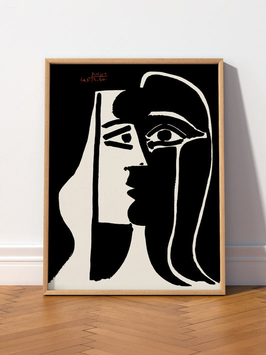 Pablo Picasso Two Faces wall art print displayed in a bright modern living room