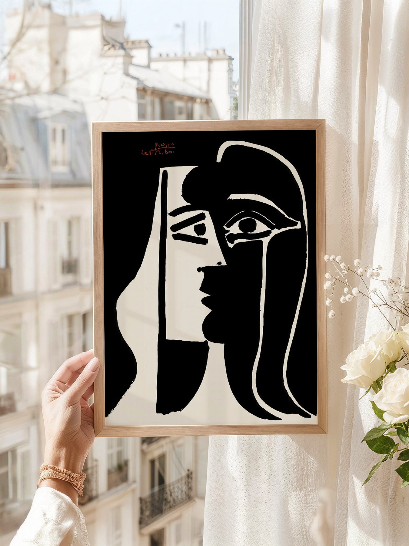 Pablo Picasso art print as wall decor in a minimalist home office
