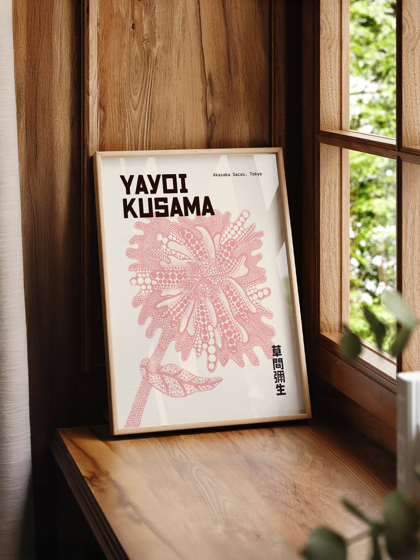Yayoi Kusama Pink Flower print styled in a mid-century modern dining room