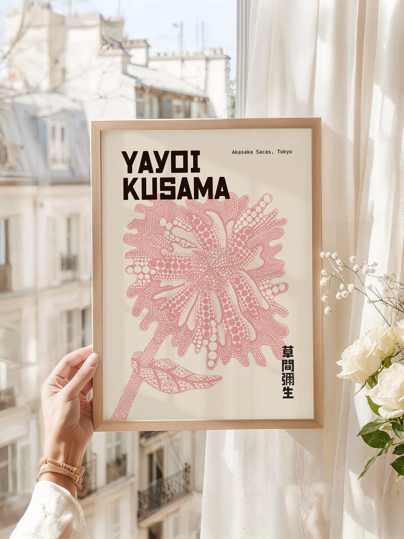 Yayoi Kusama art print as wall decor in a minimalist home office