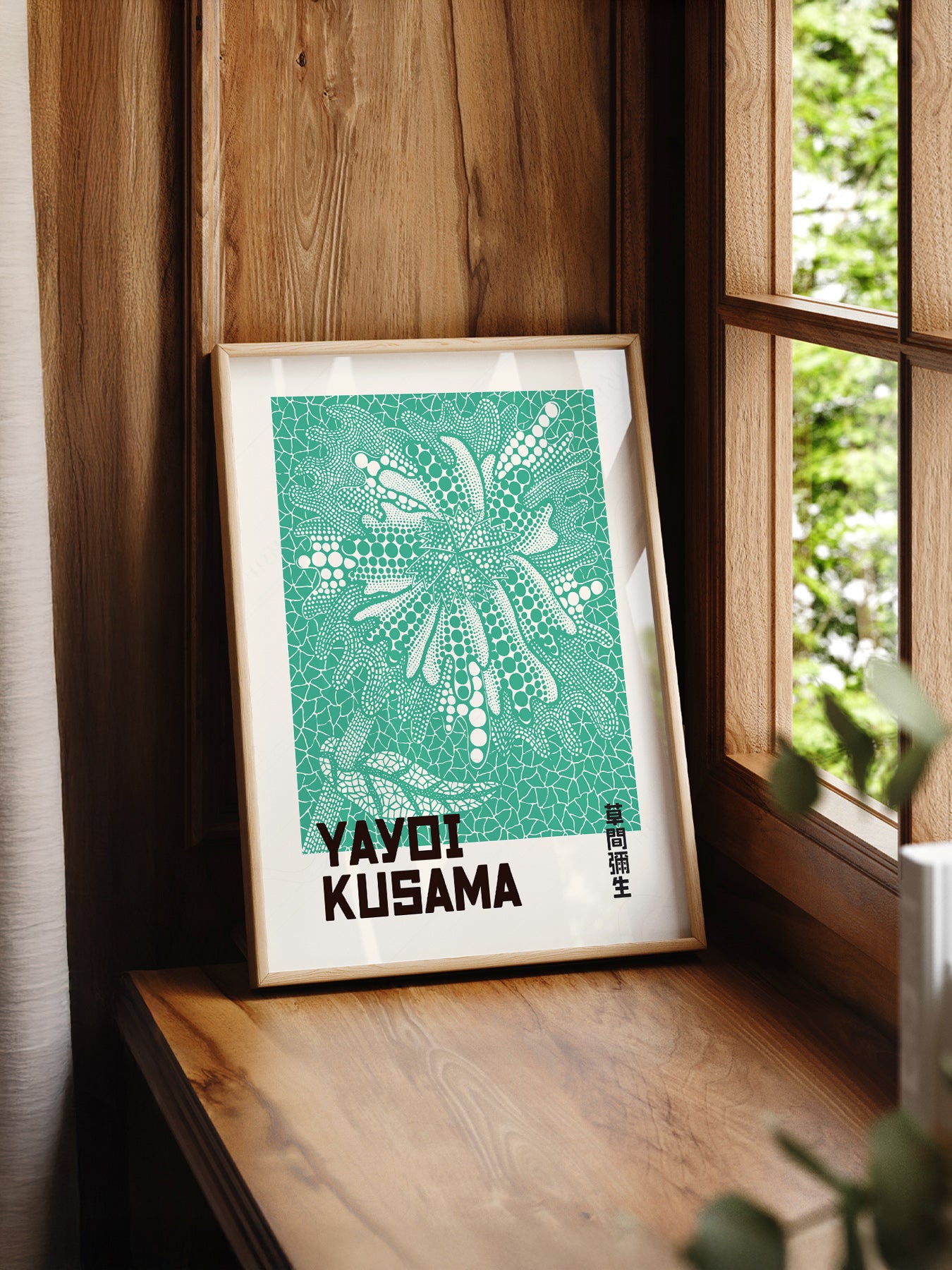Yayoi Kusama Green Botanical print styled in a mid-century modern dining room