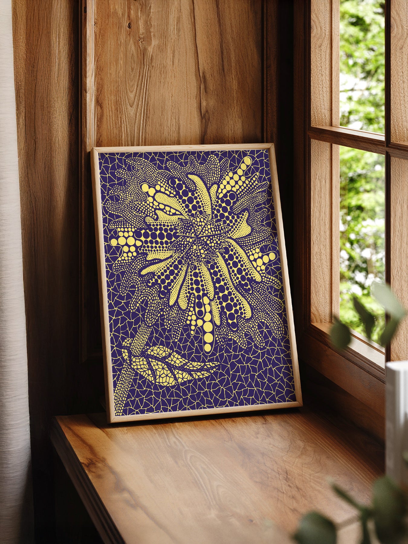 Yayoi Kusama Flower print styled in a mid-century modern dining room